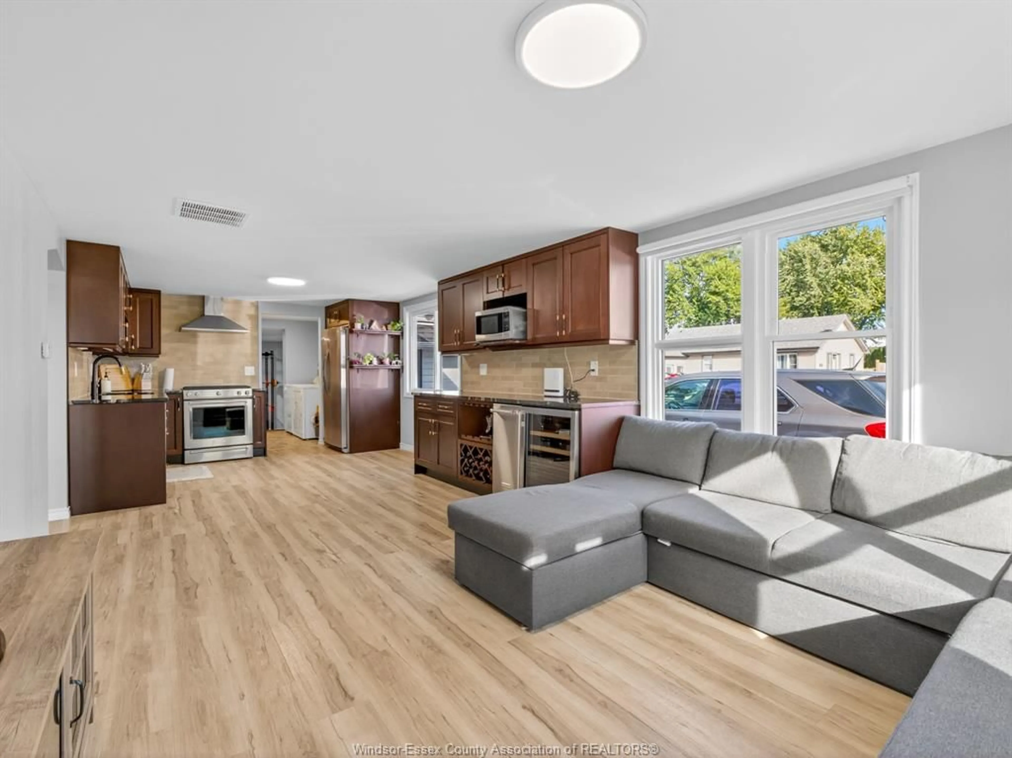 Open concept kitchen, wood/laminate floor for 295 VICTORY St, LaSalle Ontario N9J 1V5