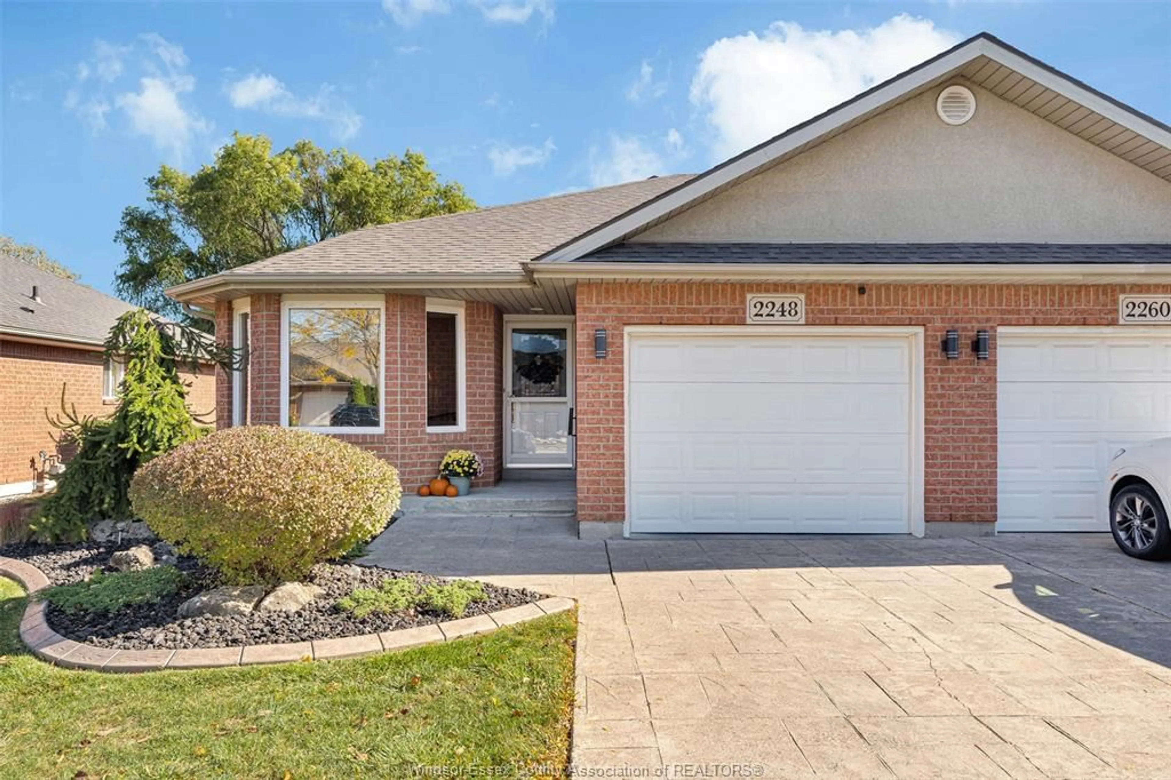 Home with brick exterior material, street for 2248 QUESTA, Windsor Ontario N8P 1N8