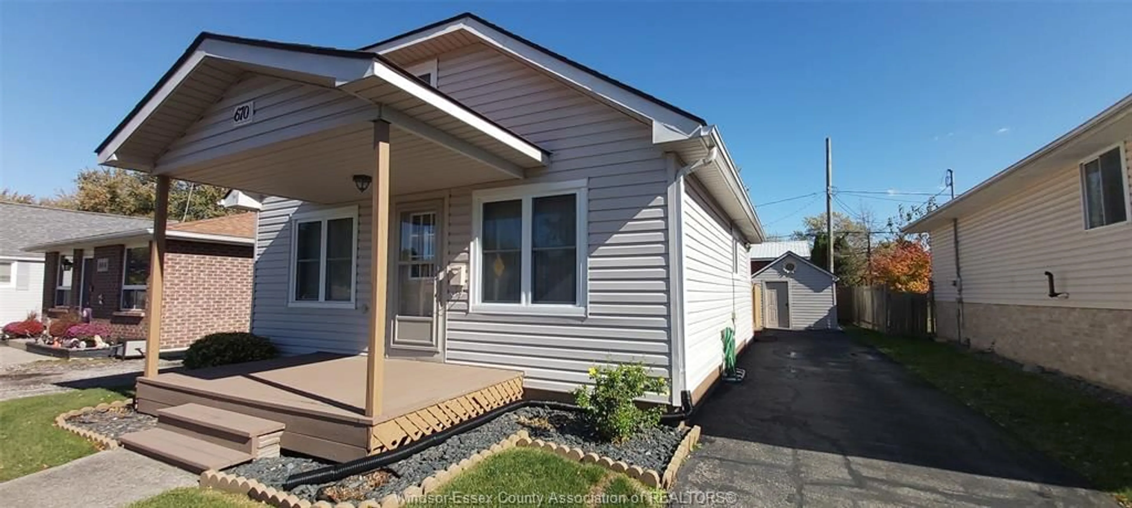 Home with vinyl exterior material, street for 670 LABUTE St, Tecumseh Ontario N8N 2B3