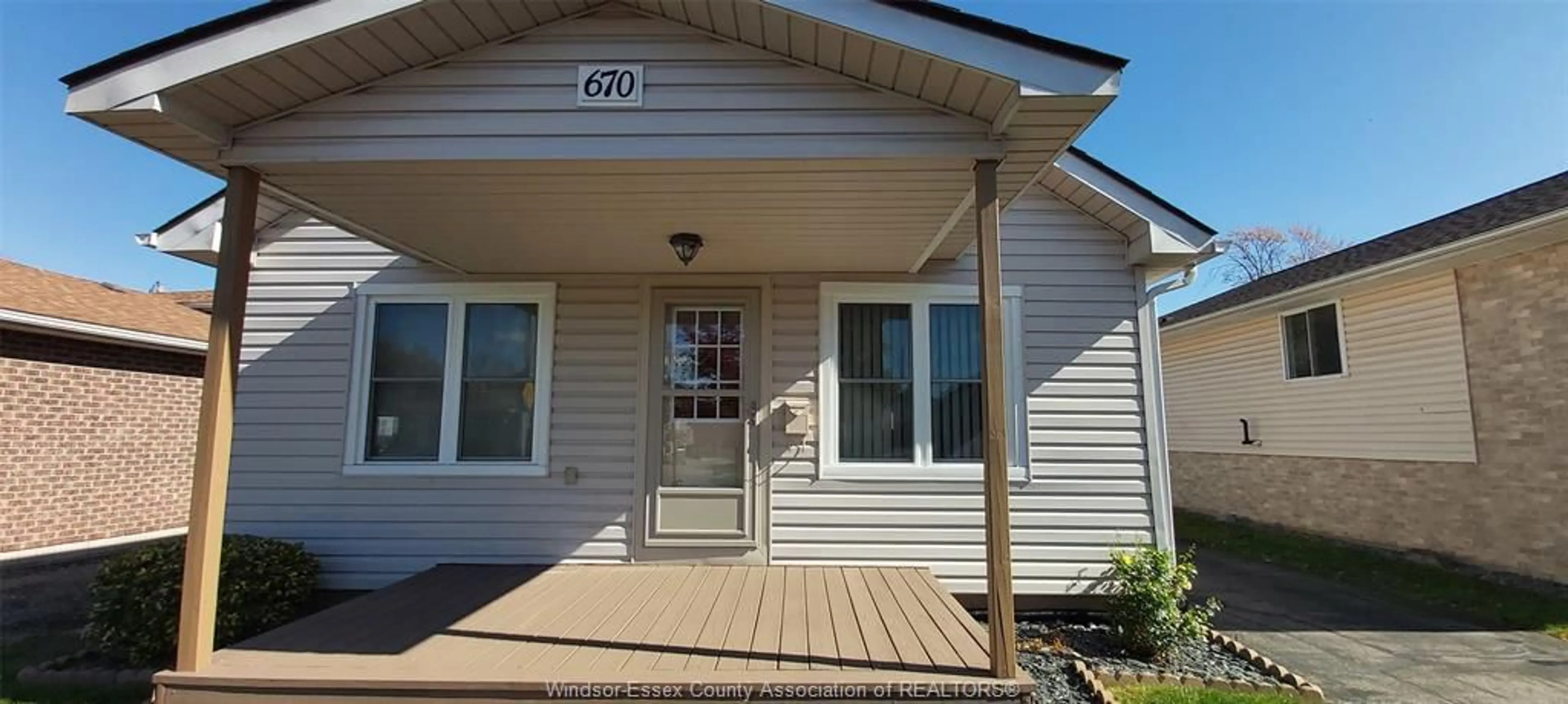 Home with vinyl exterior material, street for 670 LABUTE St, Tecumseh Ontario N8N 2B3