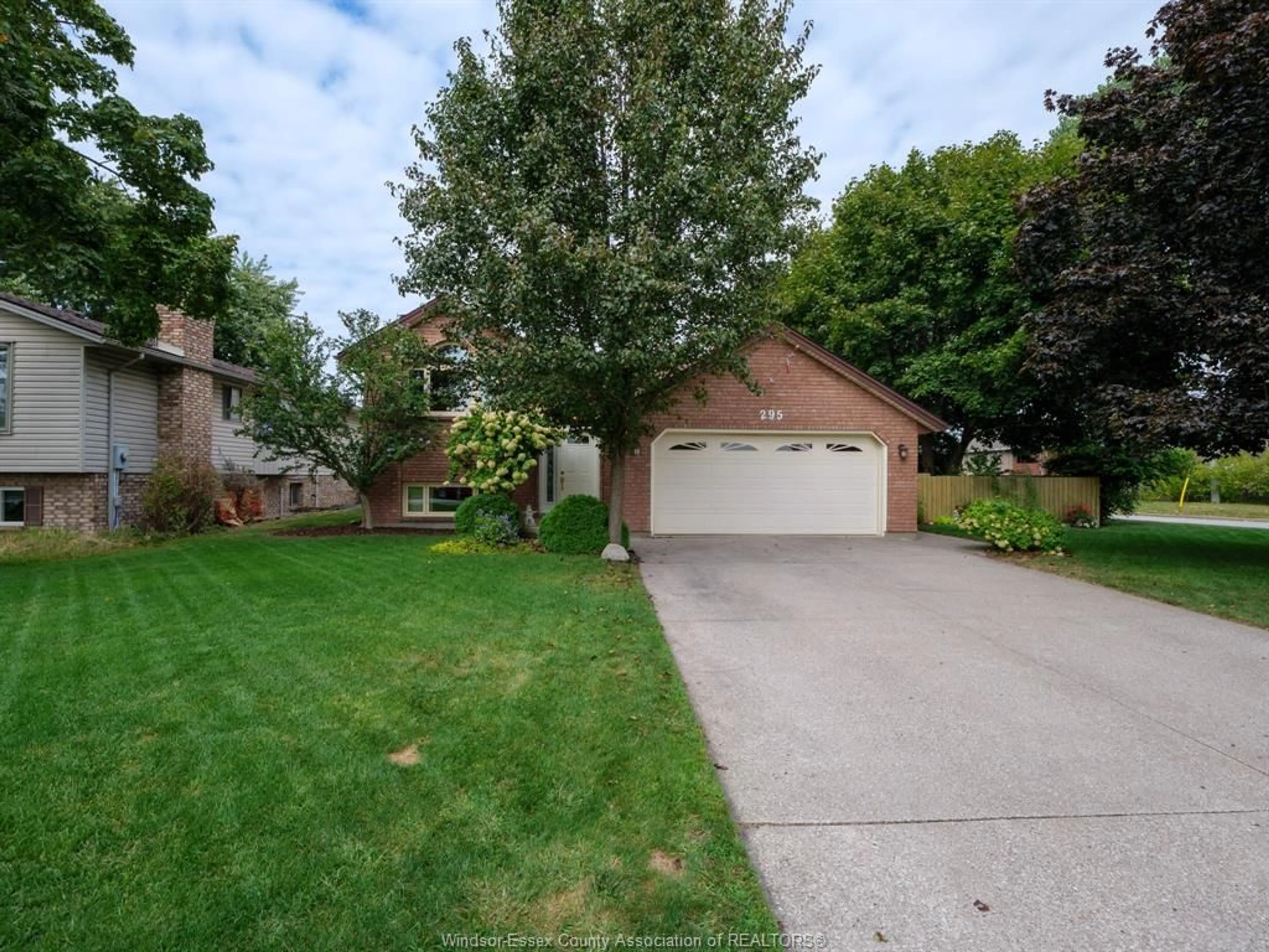 A pic from outside/outdoor area/front of a property/back of a property/a pic from drone, street for 295 Gary Ave, LaSalle Ontario N9J 1V3