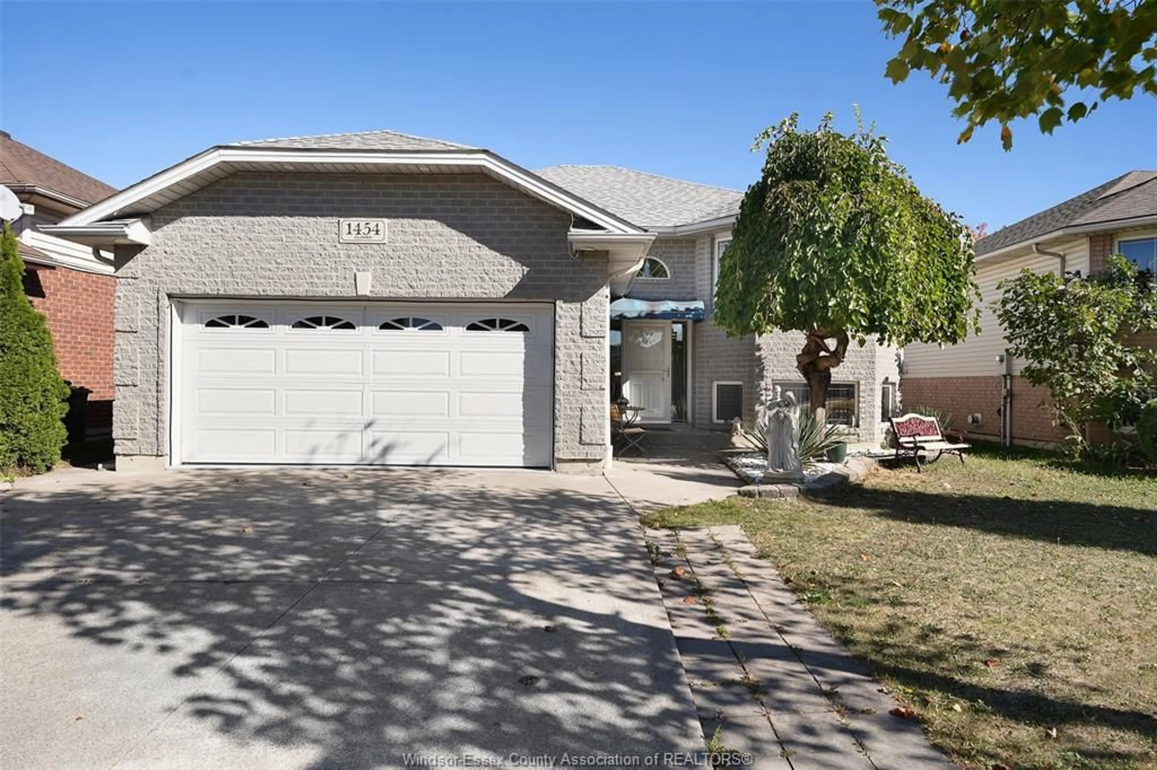 Home with vinyl exterior material, street for 1454 CLOVER Ave, Windsor Ontario N8P 1R2