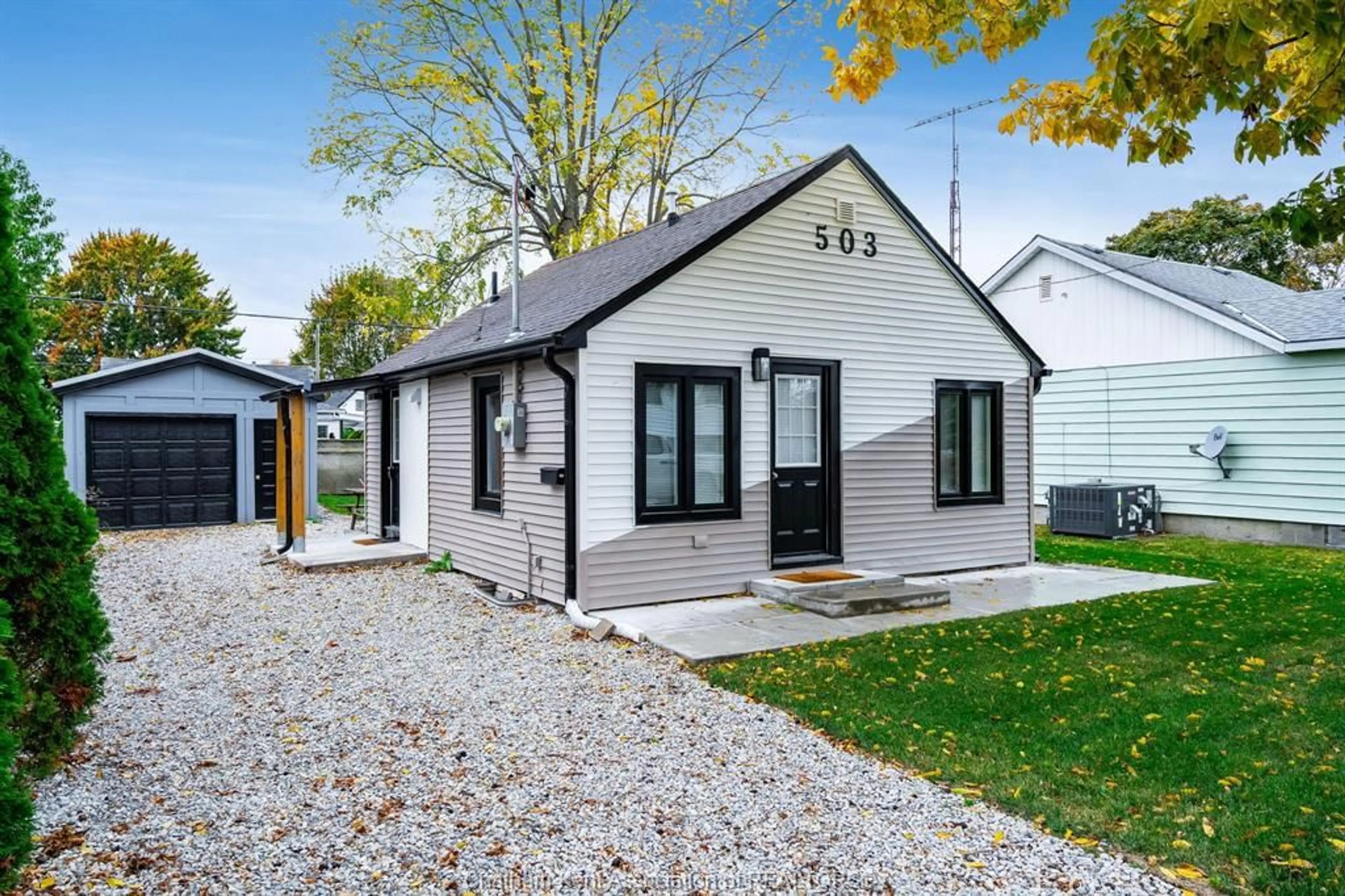 Home with vinyl exterior material, street for 503 Emily St, Wallaceburg Ontario N8A 4K6