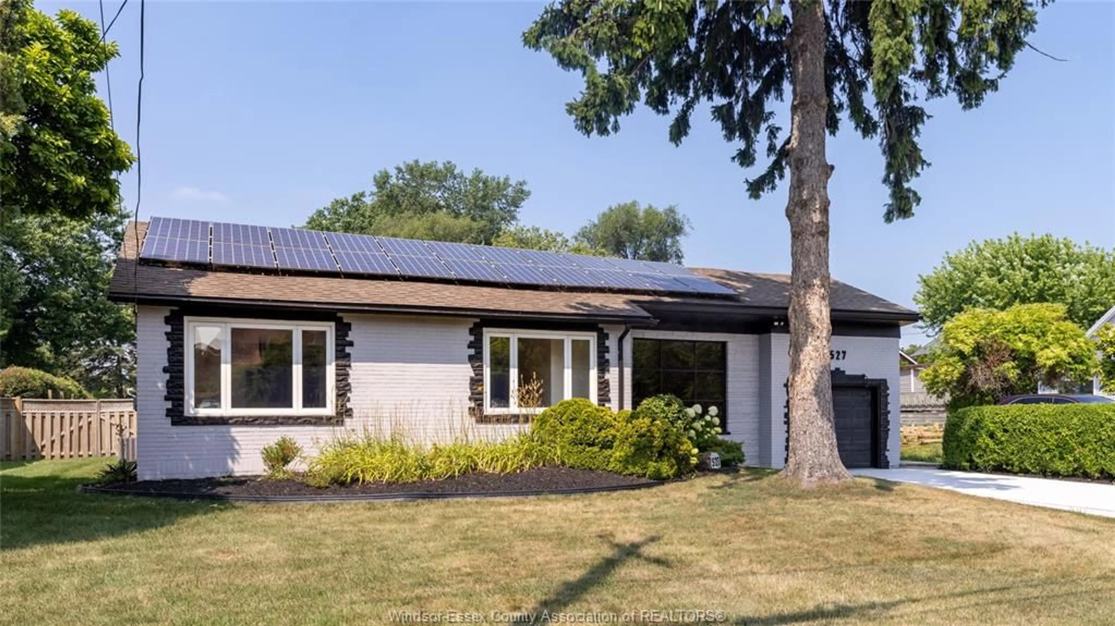 Home with vinyl exterior material, street for 527 Jarvis Ave, Windsor Ontario N8P 1C8