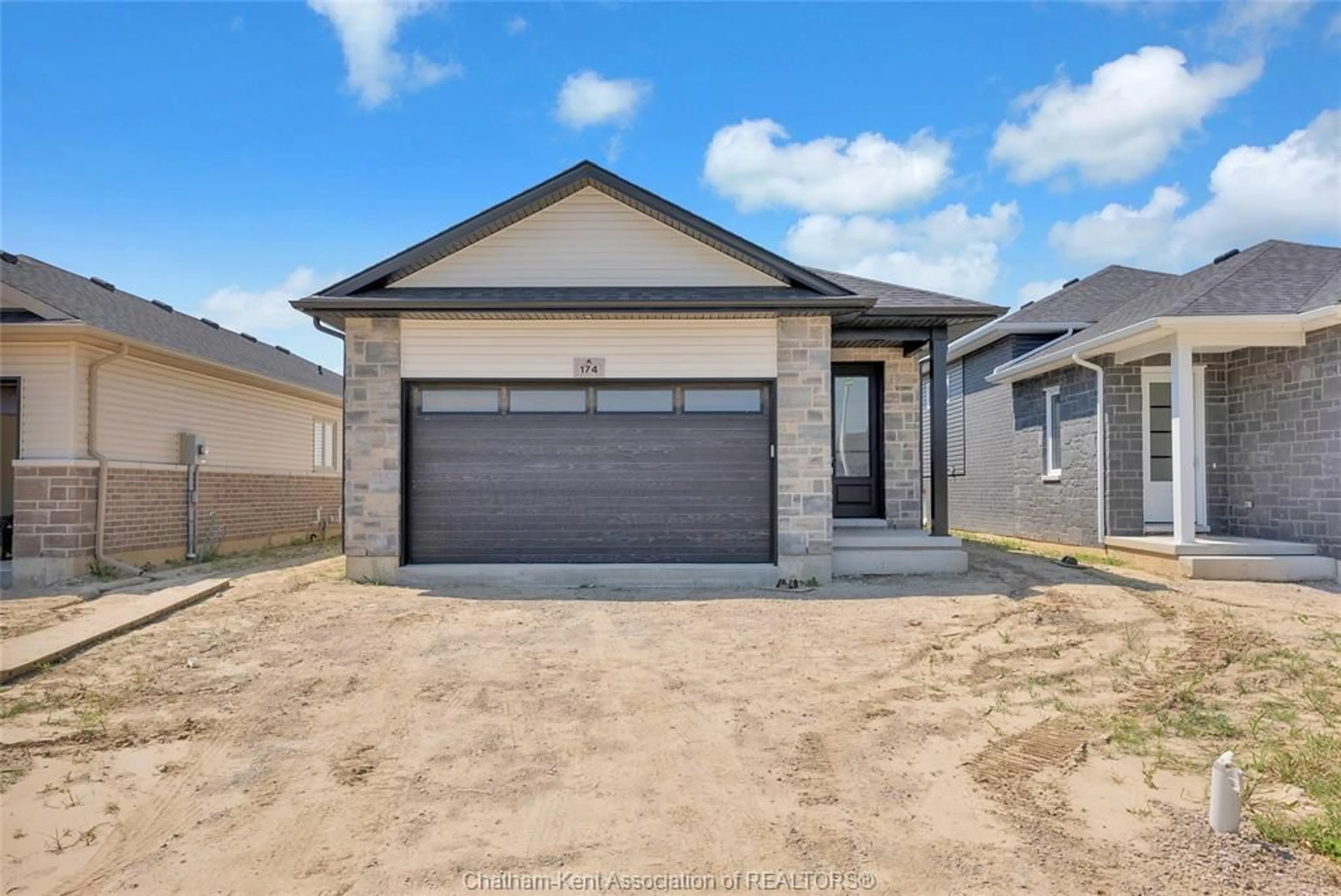 Home with brick exterior material, street for 174 IRONWOOD Trail, Chatham Ontario N7M 0T3