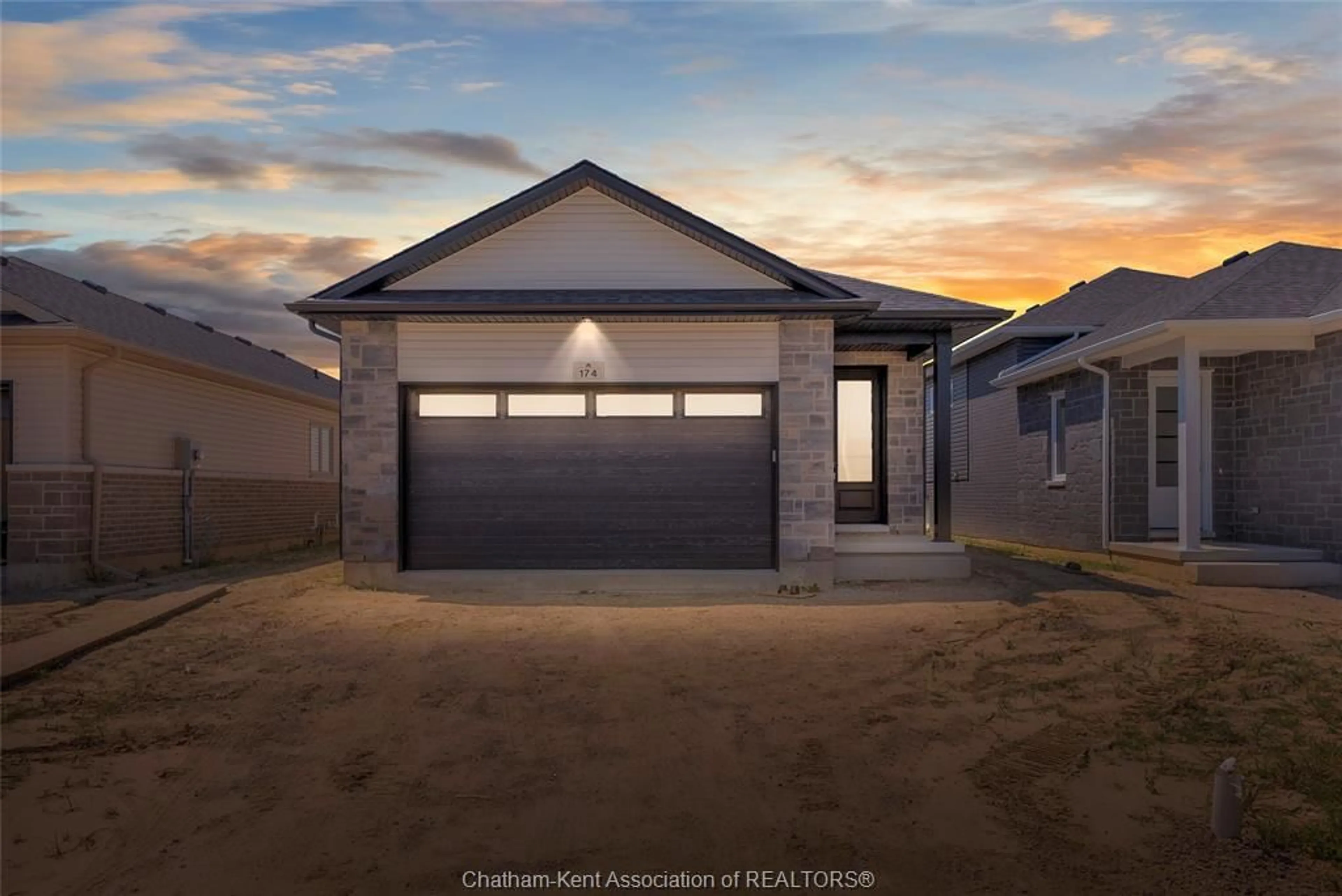 Home with vinyl exterior material, street for 174 IRONWOOD Trail, Chatham Ontario N7M 0T3