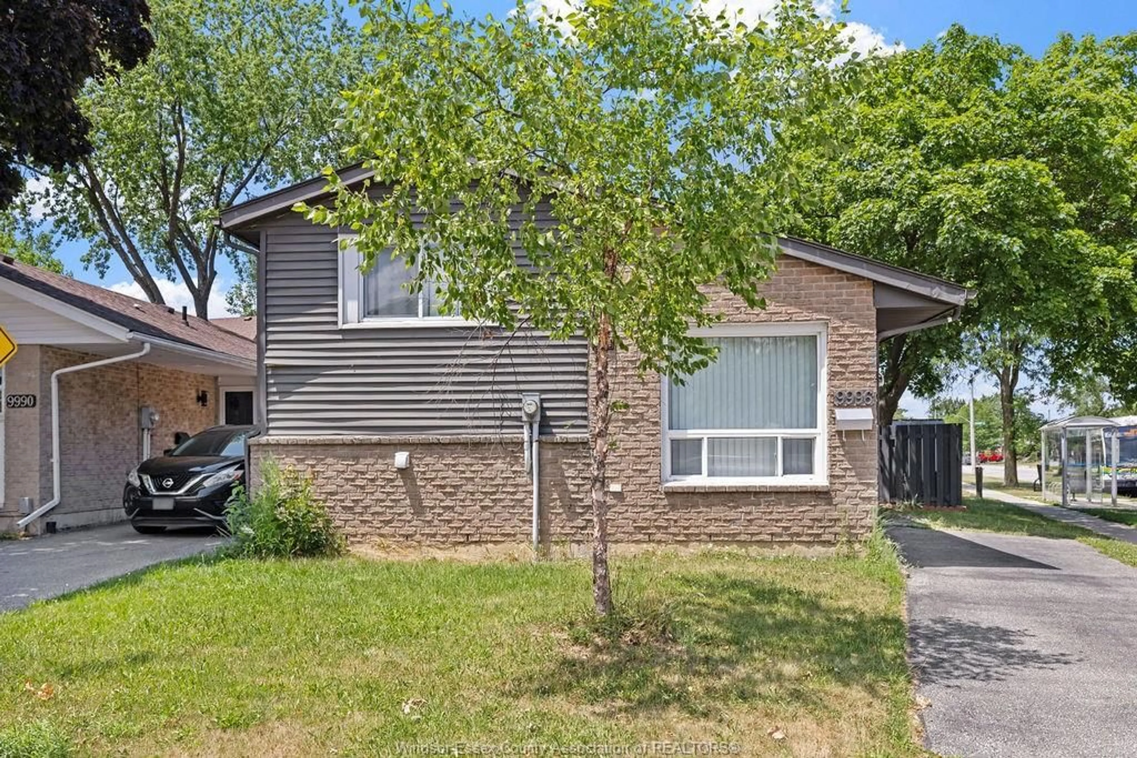 Home with brick exterior material, street for 9996 FOREST GLADE Crt, Windsor Ontario N8R 1W7