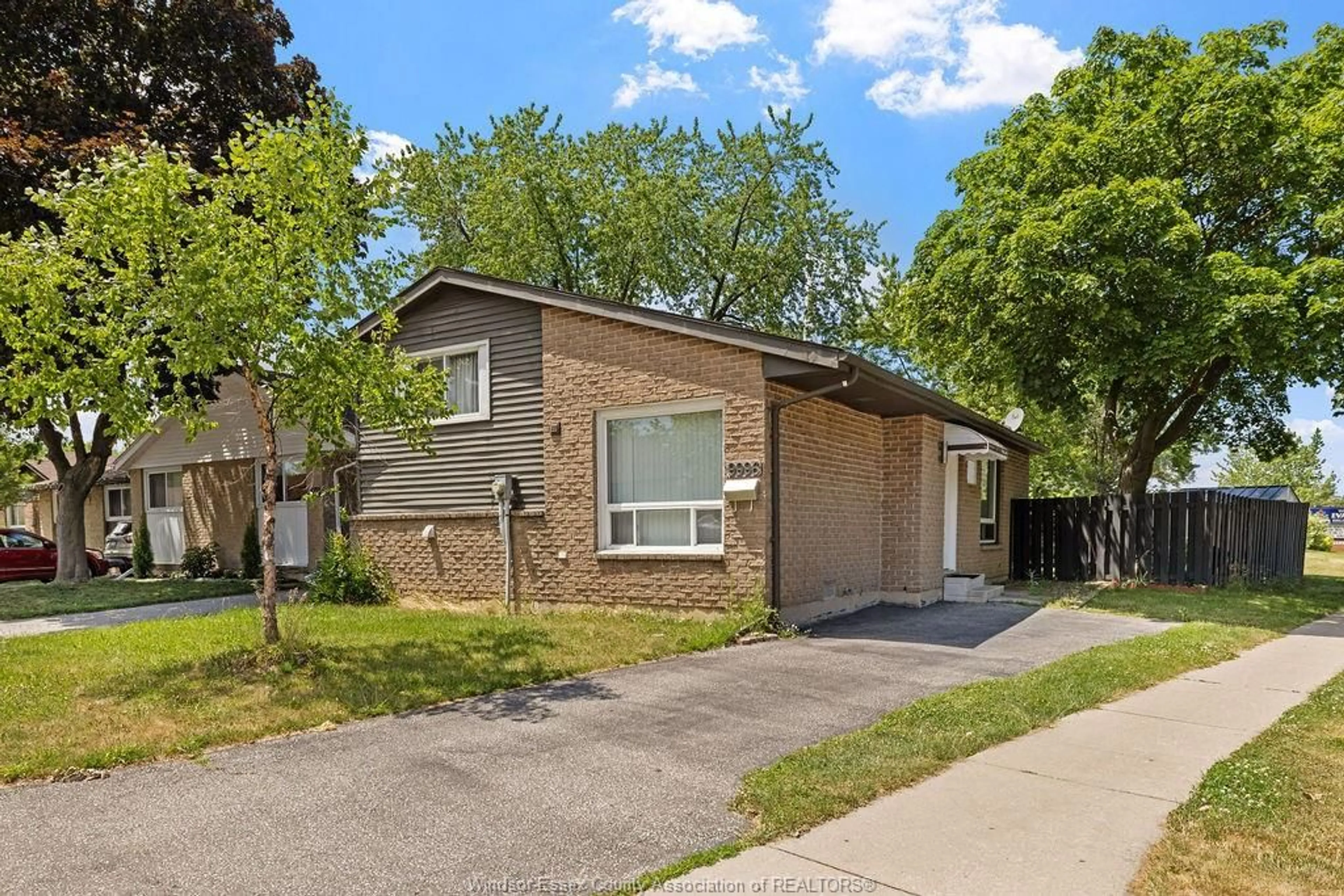 Home with brick exterior material, street for 9996 FOREST GLADE Crt, Windsor Ontario N8R 1W7