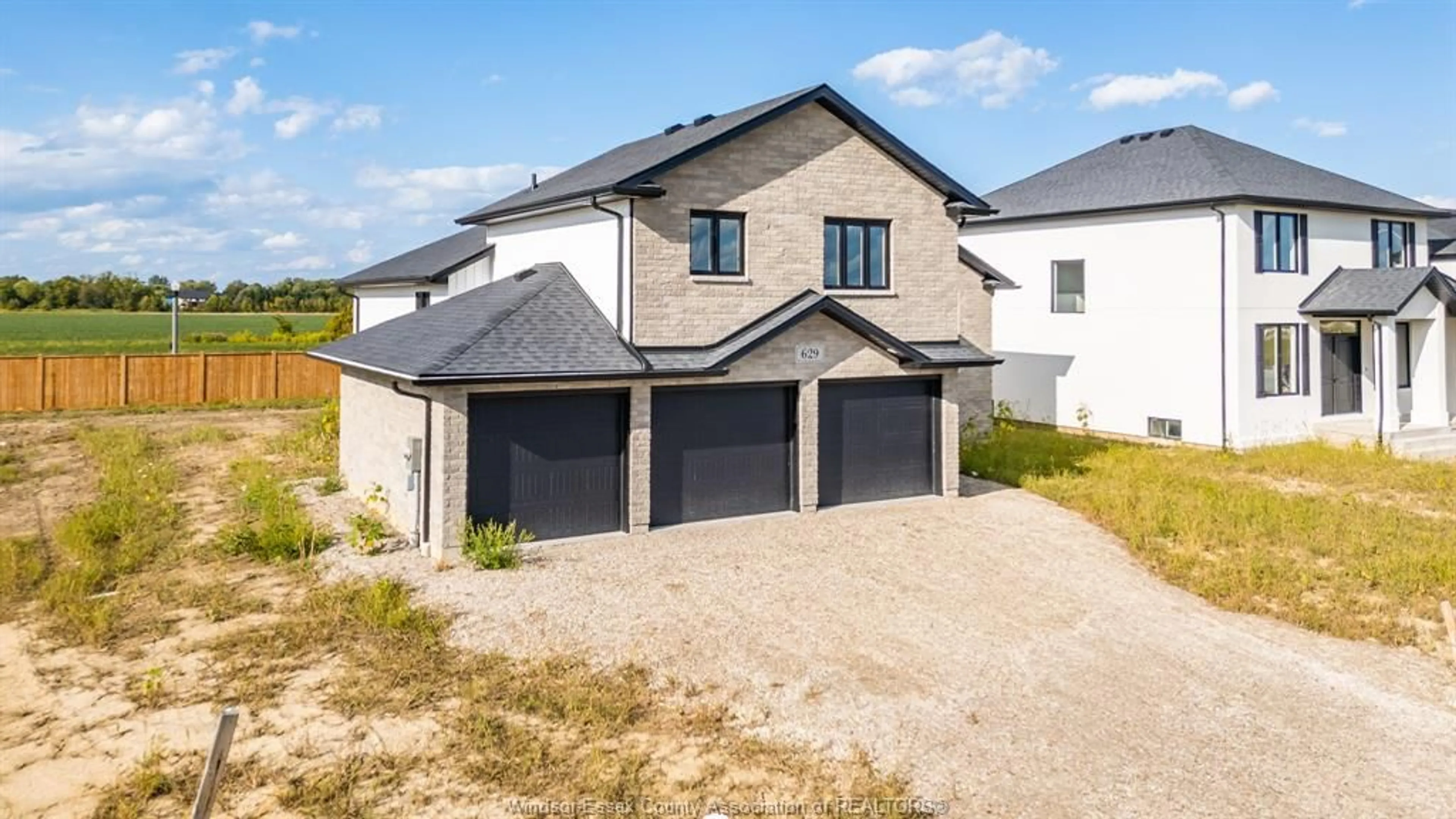 A pic from outside/outdoor area/front of a property/back of a property/a pic from drone, street for 629 SUMMIT St, Lakeshore Ontario N0R 1A7
