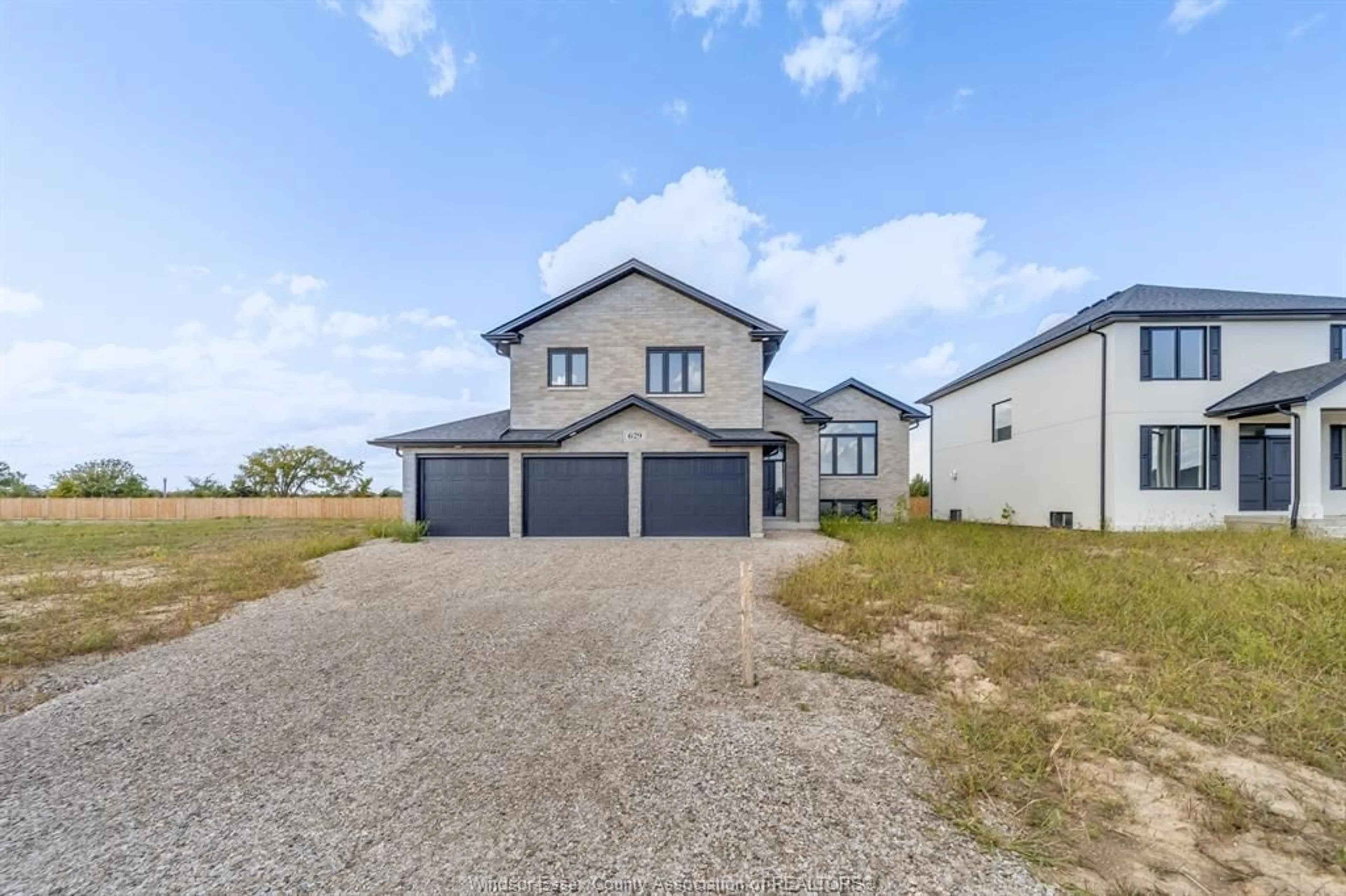 A pic from outside/outdoor area/front of a property/back of a property/a pic from drone, street for 629 SUMMIT St, Lakeshore Ontario N0R 1A7
