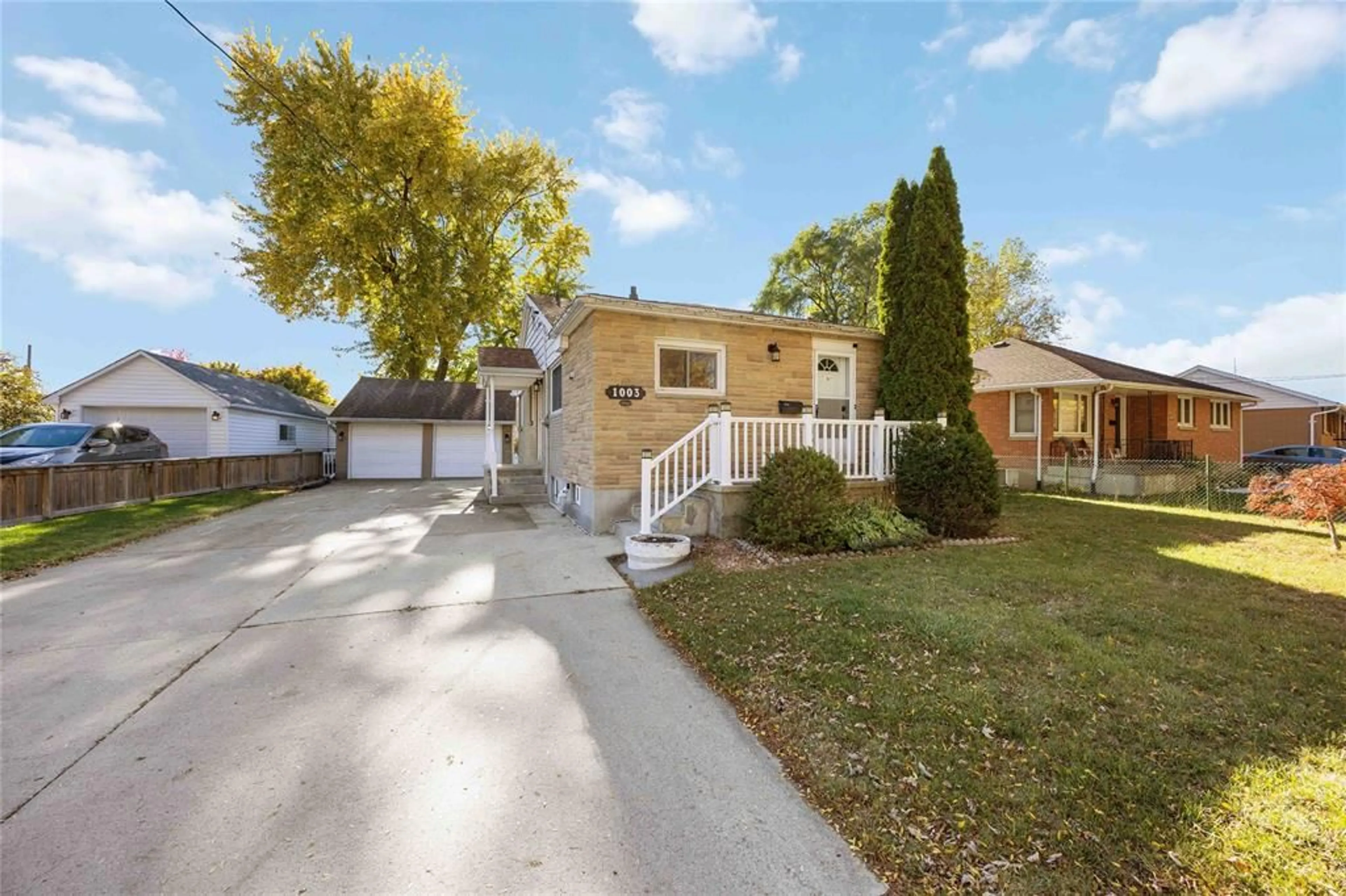 Home with vinyl exterior material, street for 1003 GERMAIN St, Sarnia Ontario N7S 1L9