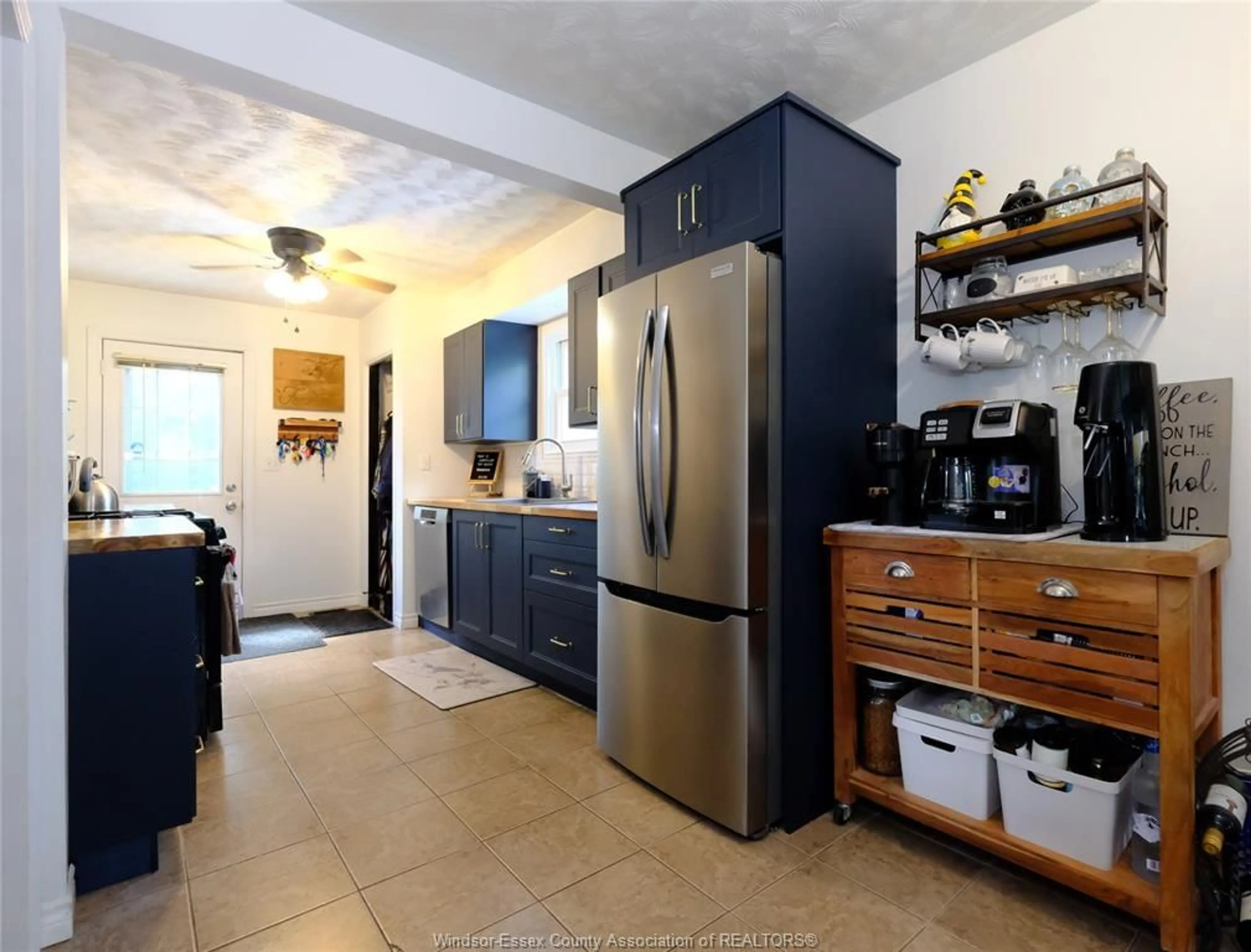 Open concept kitchen, ceramic/tile floor for 49 Delta, Harrow Ontario N0R 1G0