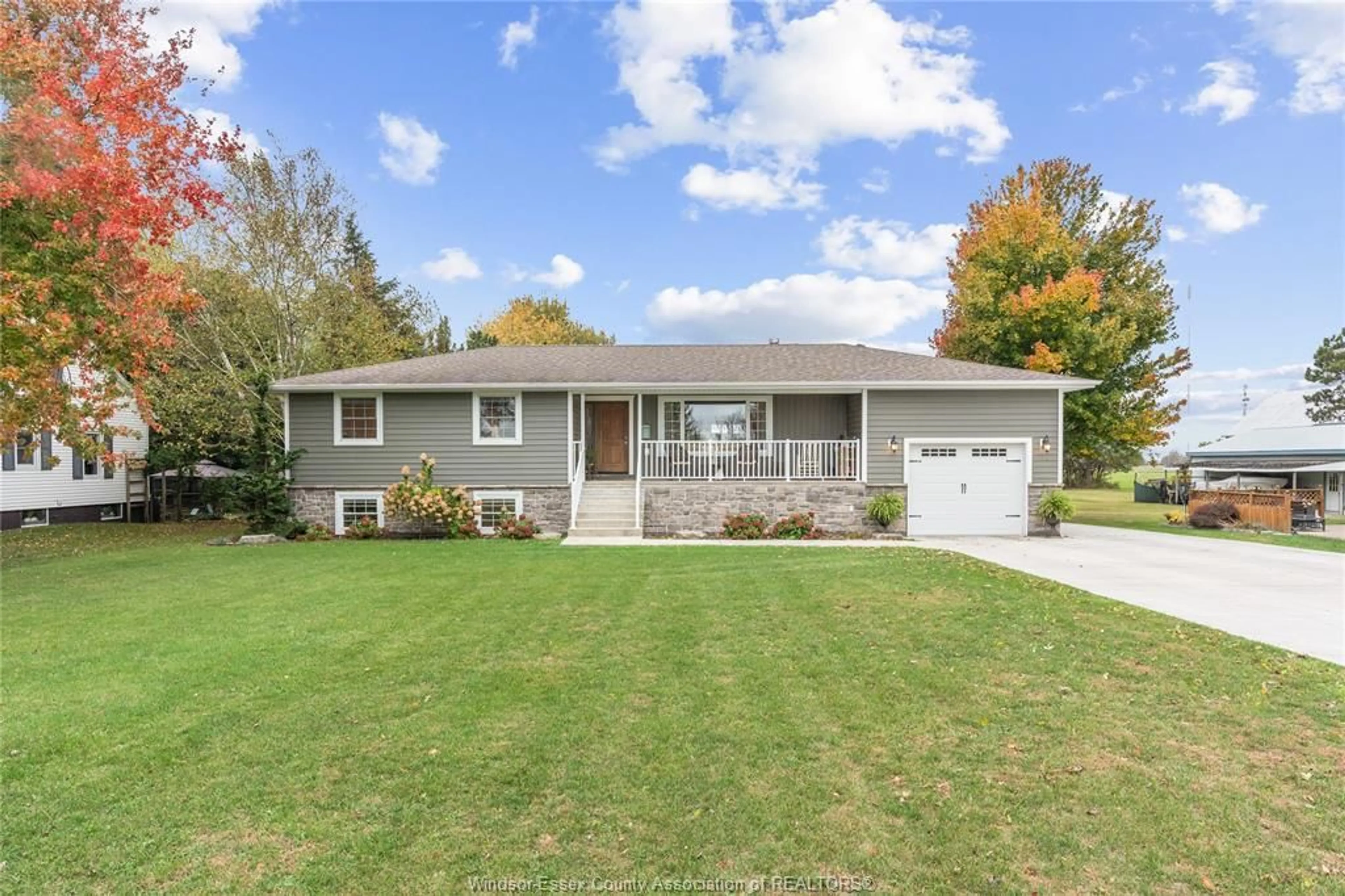 Home with vinyl exterior material, street for 215 COUNTY RD 34 W, Cottam Ontario N8M 2X5