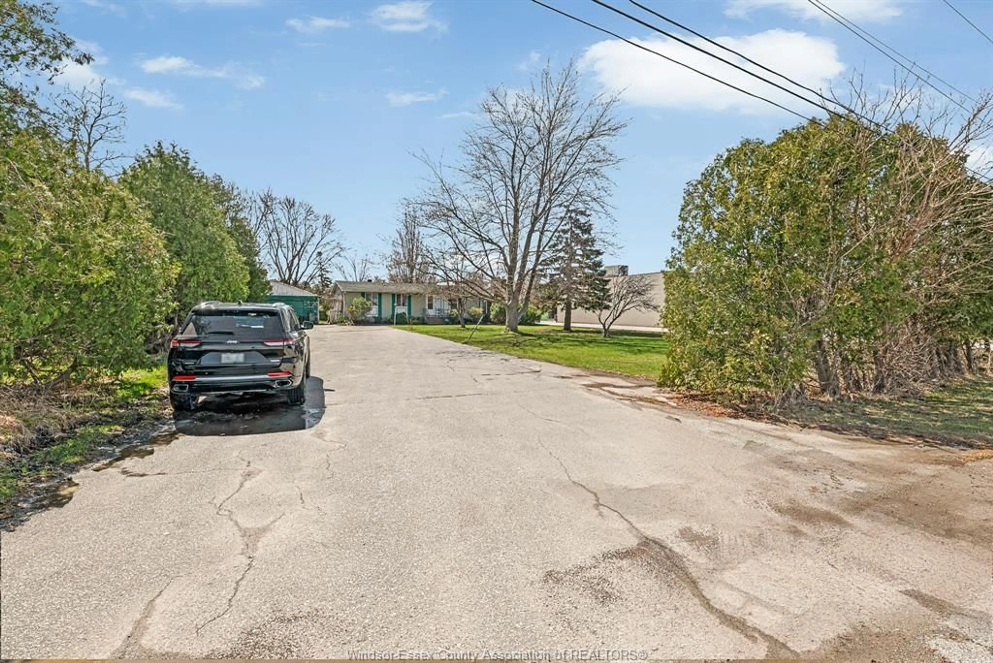 A pic from outside/outdoor area/front of a property/back of a property/a pic from drone, street for 3425 COUNTY RD 42, Windsor Ontario N8V 0A5