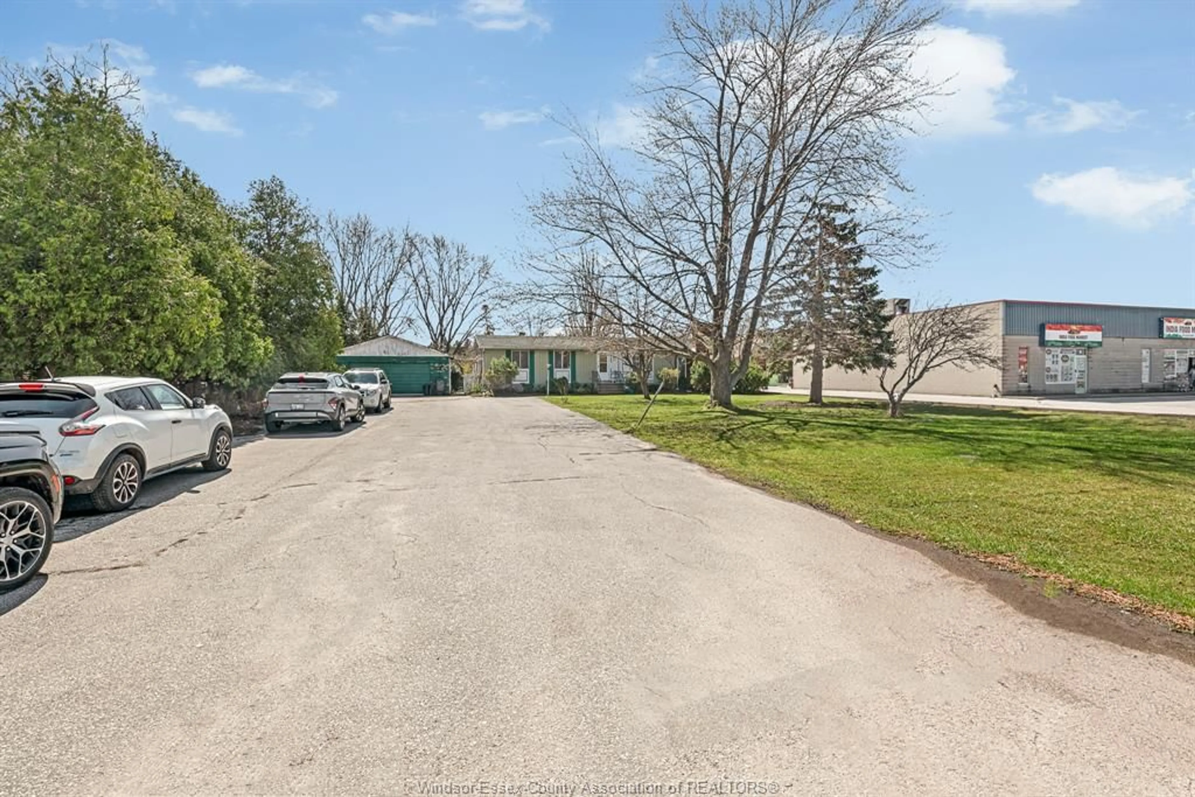 A pic from outside/outdoor area/front of a property/back of a property/a pic from drone, street for 3425 COUNTY RD 42, Windsor Ontario N8V 0A5