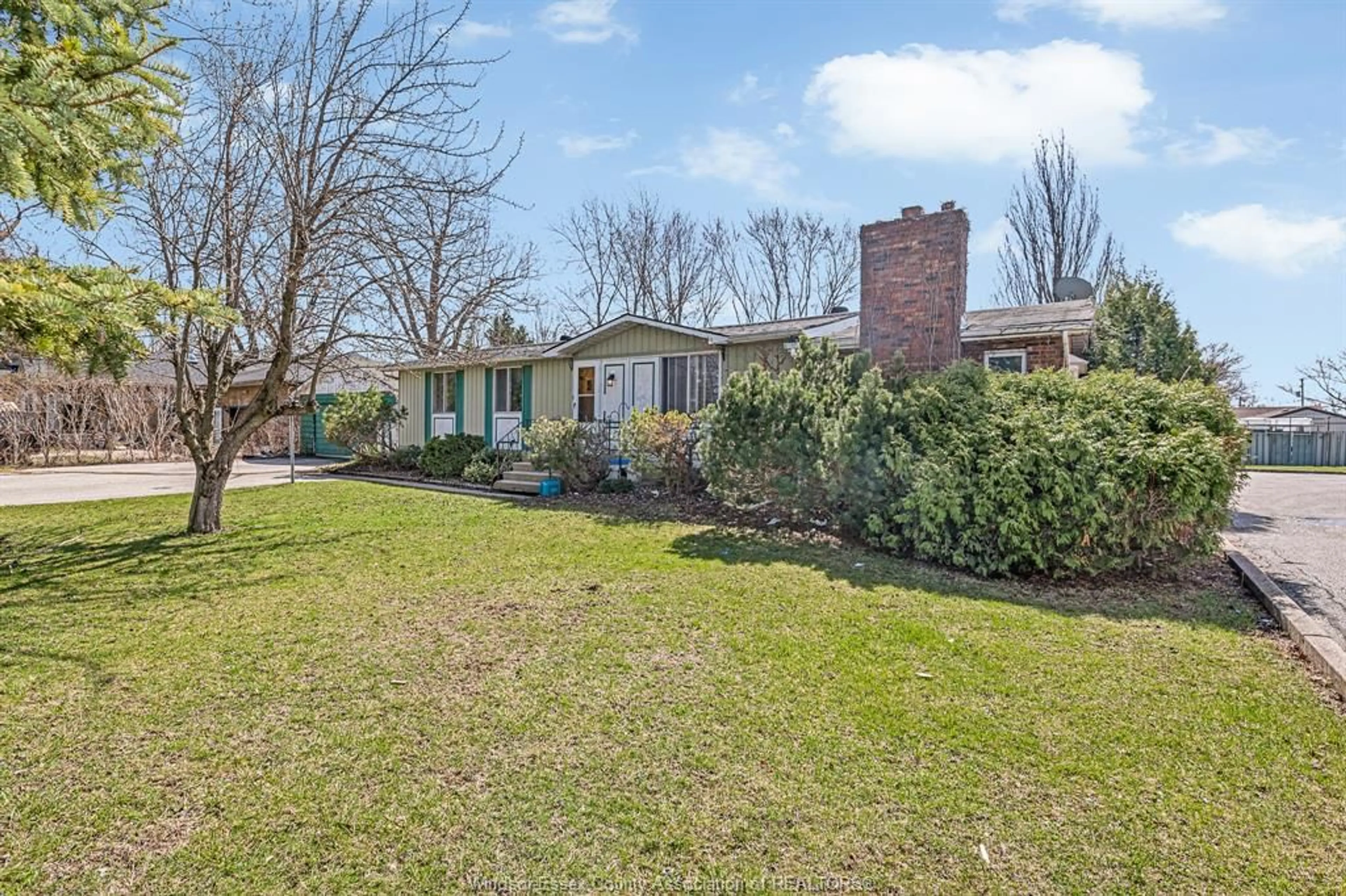 A pic from outside/outdoor area/front of a property/back of a property/a pic from drone, street for 3425 COUNTY RD 42, Windsor Ontario N8V 0A5