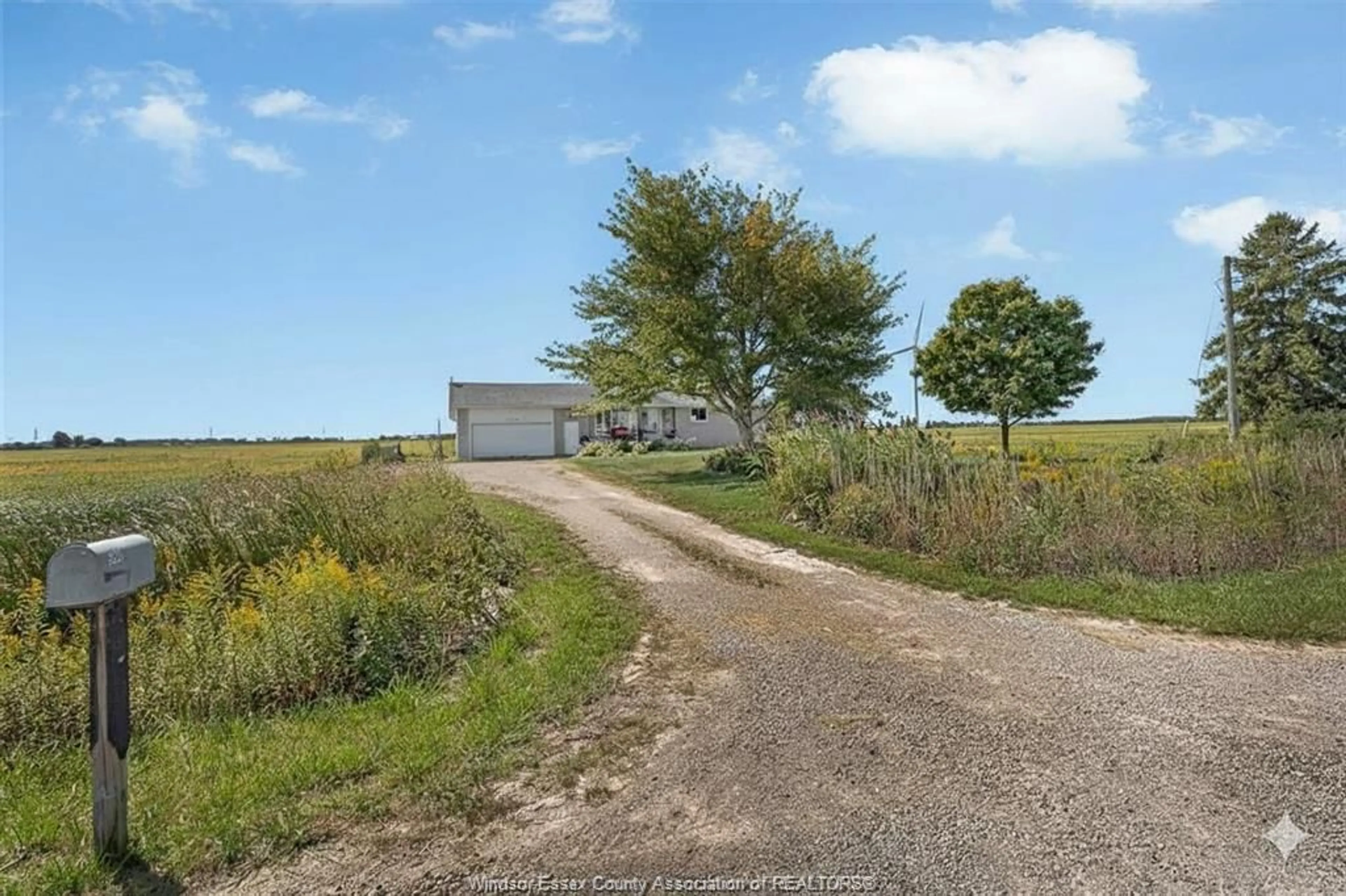 A pic from outside/outdoor area/front of a property/back of a property/a pic from drone, street for 5429 LAKESHORE ROAD 305, Comber Ontario N0P 1J0