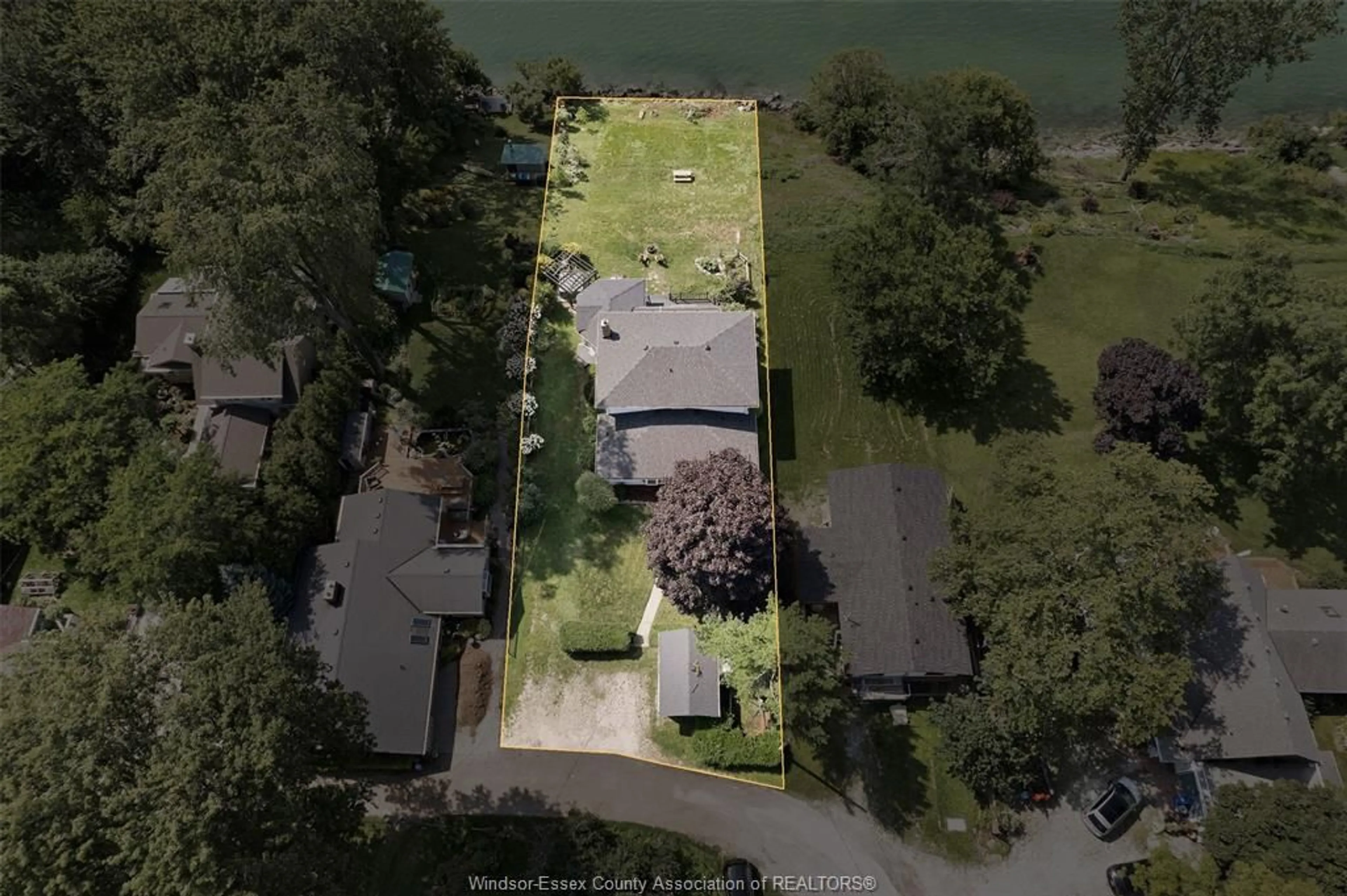 A pic from outside/outdoor area/front of a property/back of a property/a pic from drone, water/lake/river/ocean view for 659 MCCRACKEN, Kingsville Ontario N9Y 2N9