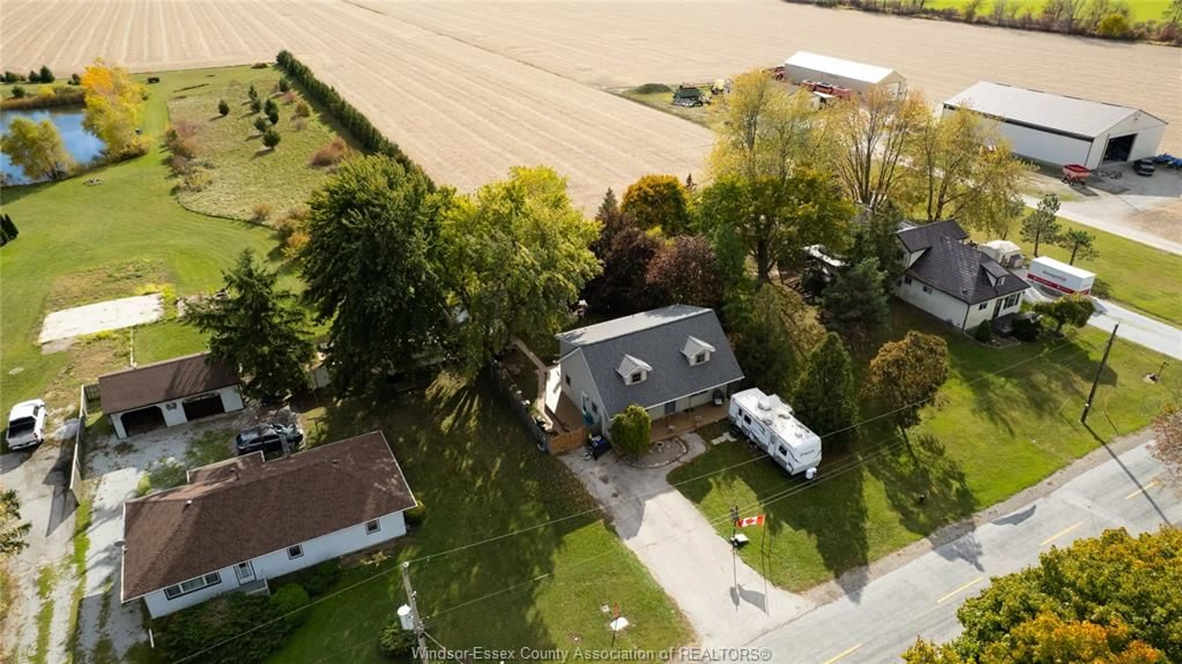 A pic from outside/outdoor area/front of a property/back of a property/a pic from drone, street for 13055 CONCESSION RD 13, Essex Ontario N0R 1J0