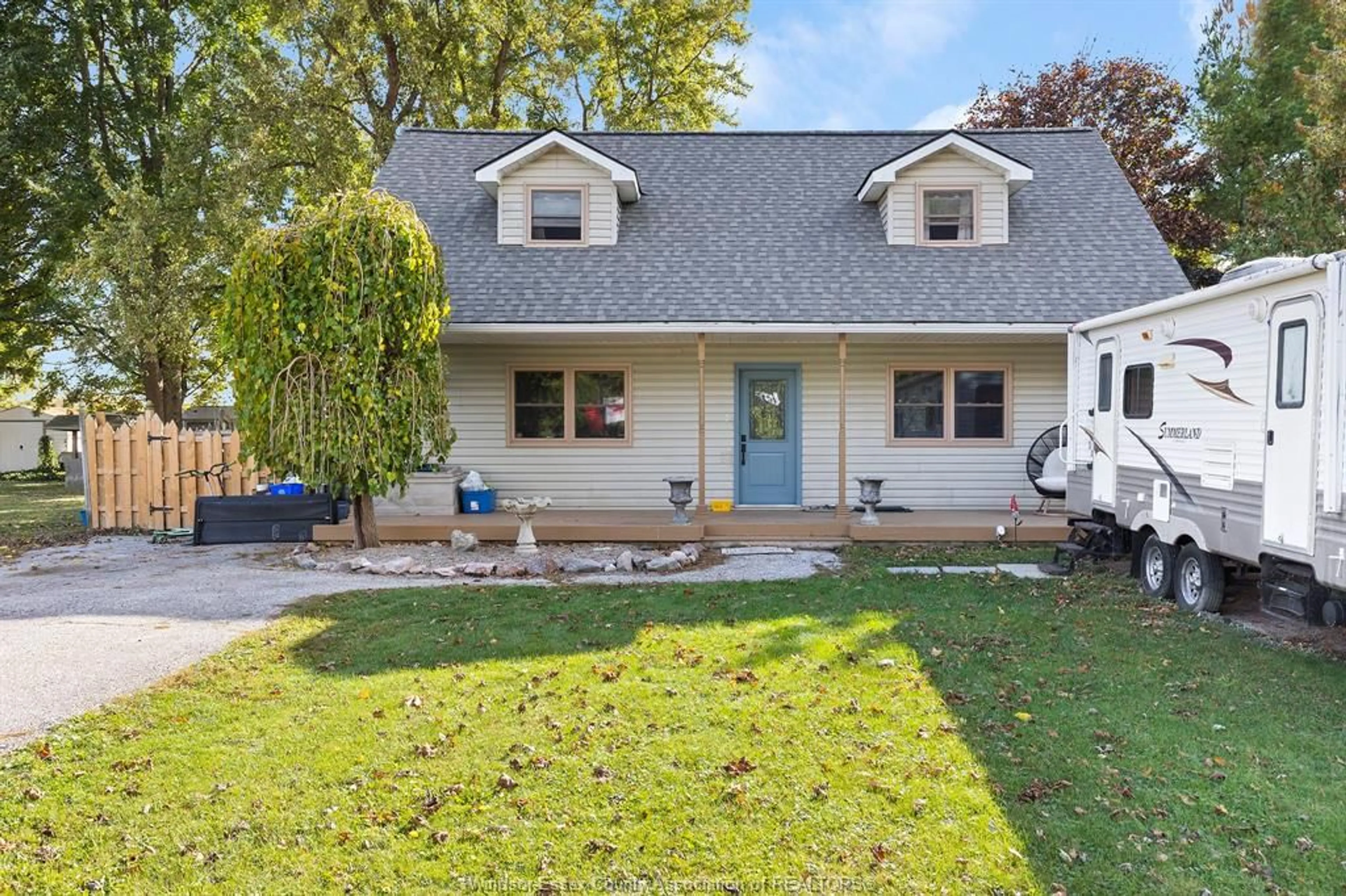 Home with vinyl exterior material, street for 13055 CONCESSION RD 13, Essex Ontario N0R 1J0