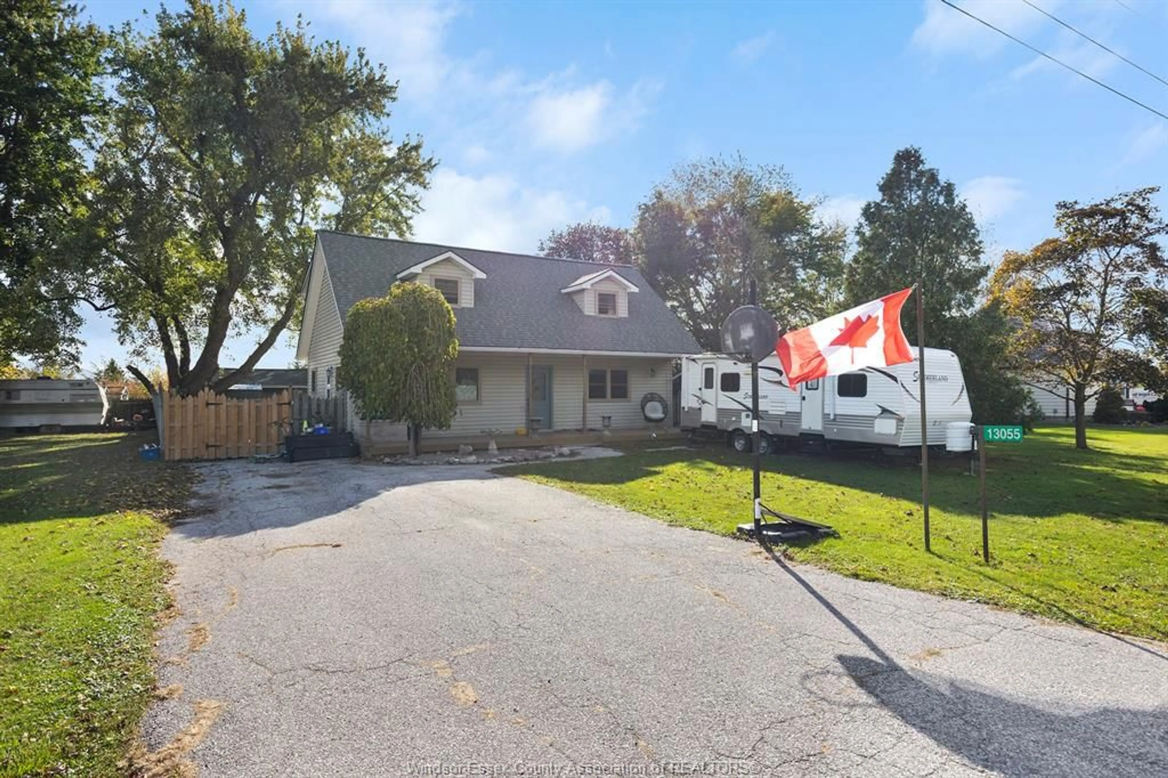 A pic from outside/outdoor area/front of a property/back of a property/a pic from drone, street for 13055 CONCESSION RD 13, Essex Ontario N0R 1J0