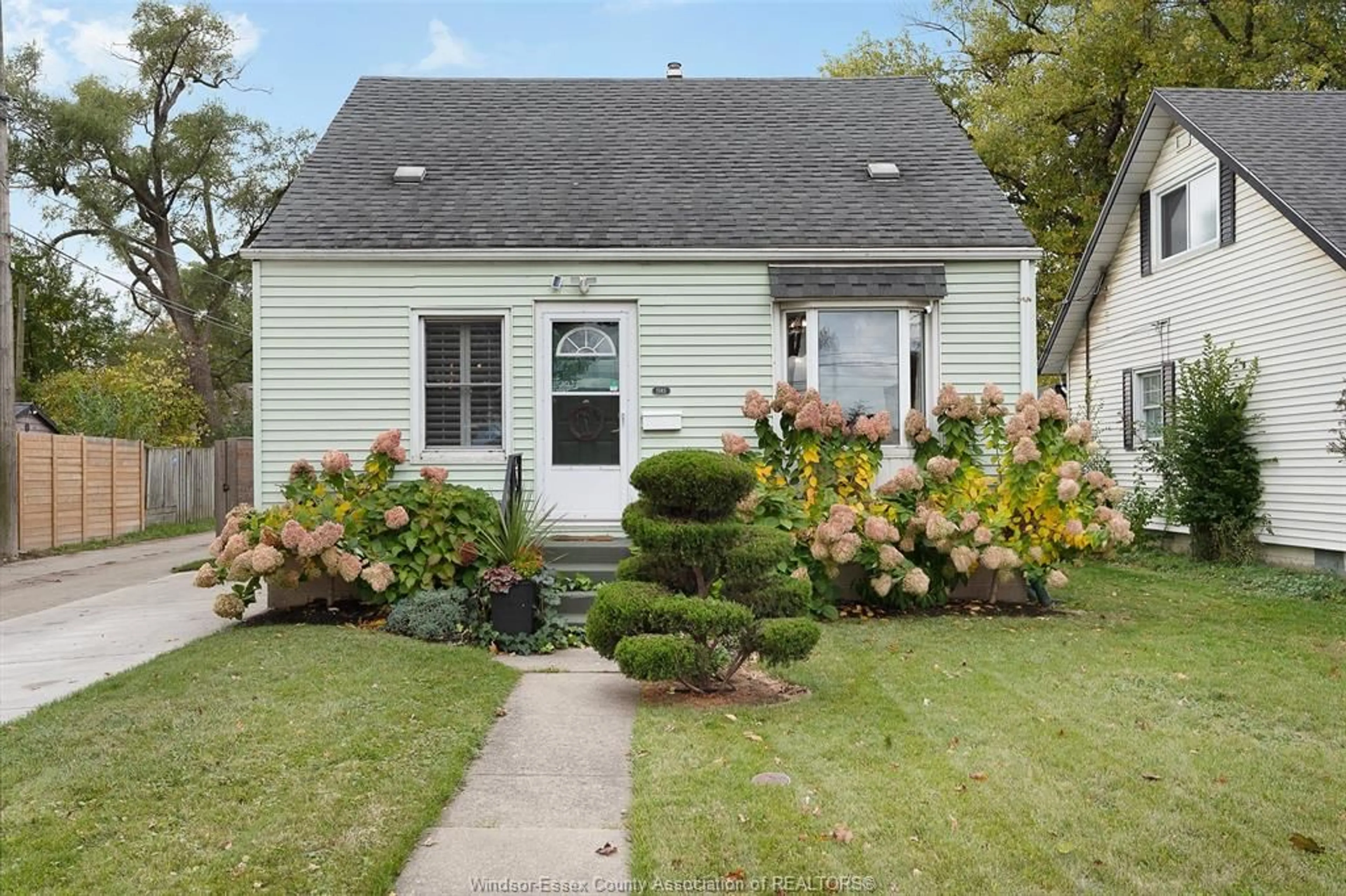Home with vinyl exterior material, street for 1585 WINDSOR Ave, Windsor Ontario N8X 3M3