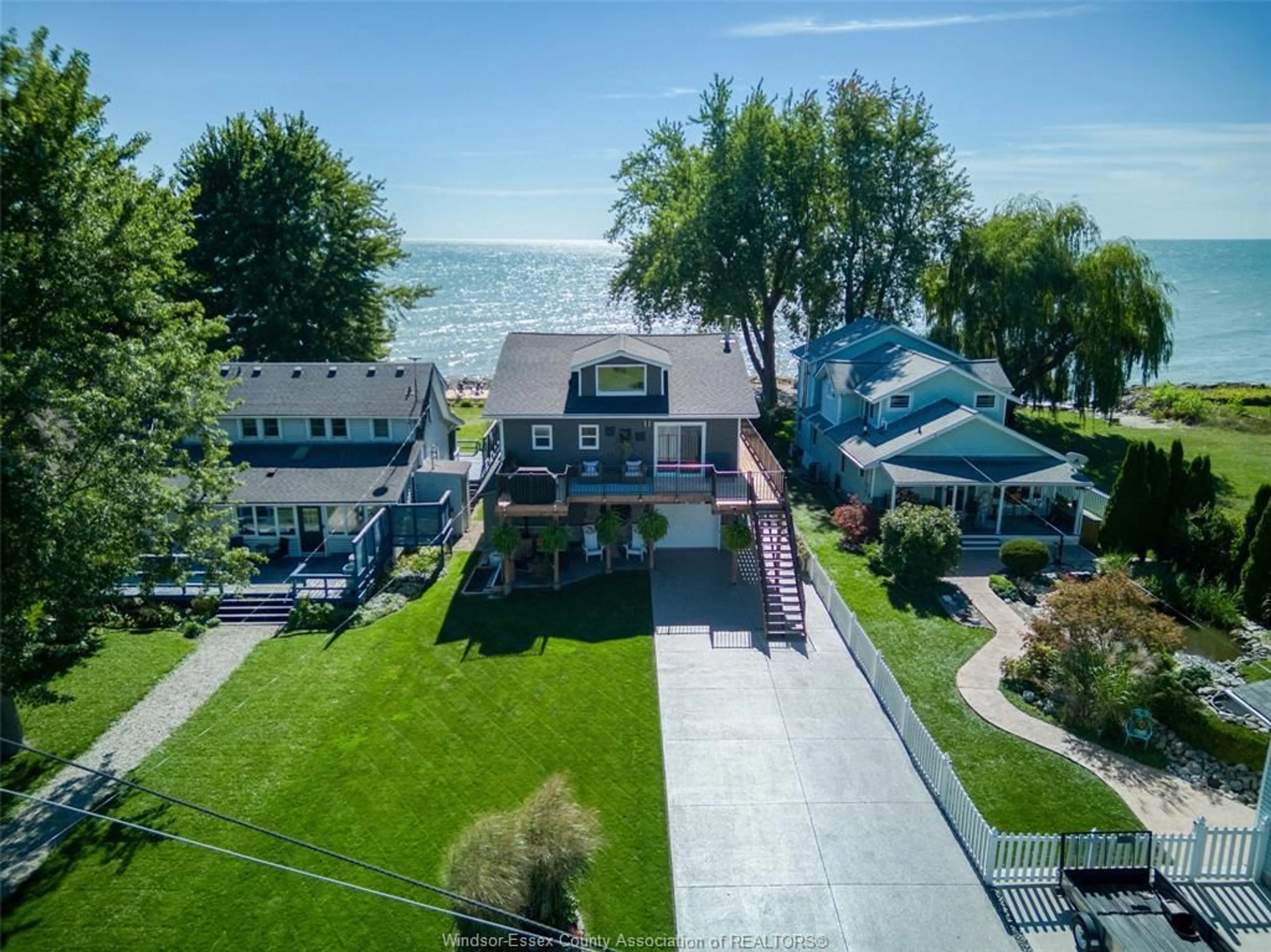 A pic from outside/outdoor area/front of a property/back of a property/a pic from drone, water/lake/river/ocean view for 165 LAKESIDE Dr, Amherstburg Ontario N0R 1G0