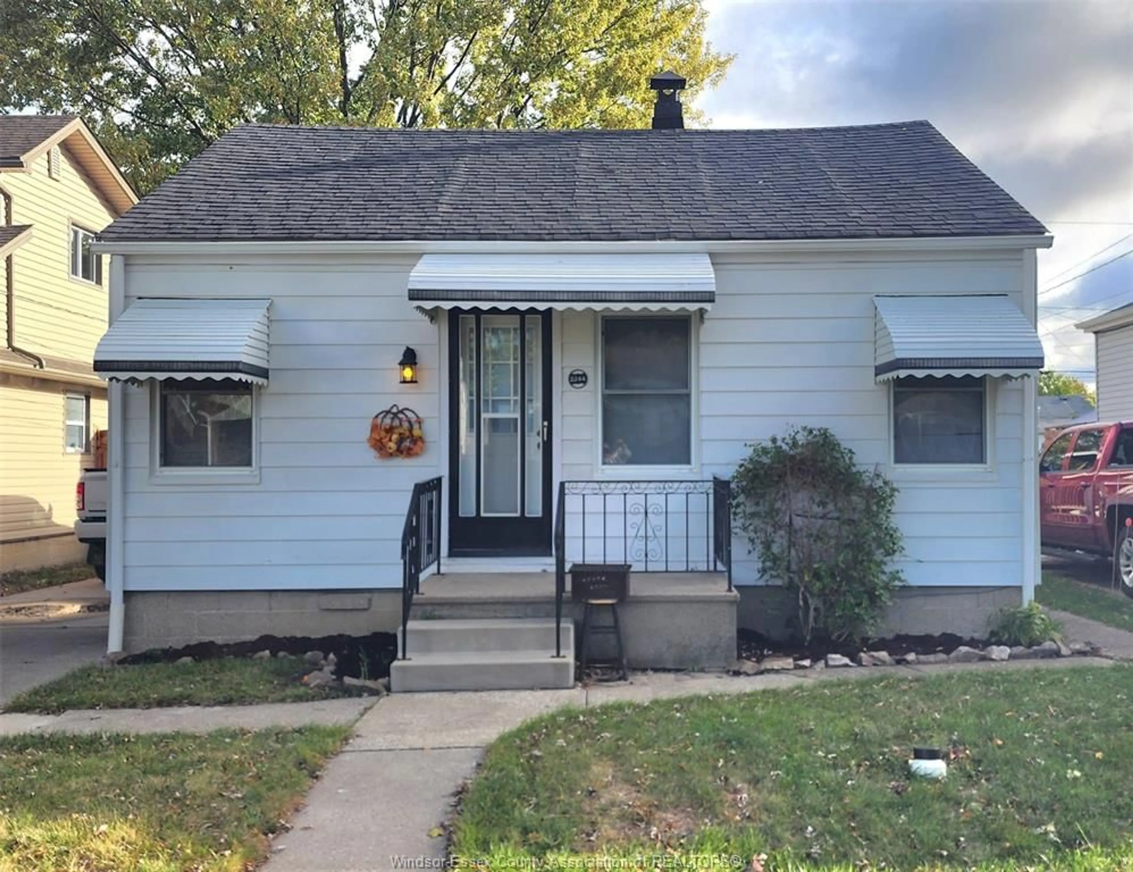Home with vinyl exterior material, street for 2244 PARENT, Windsor Ontario N8W 2E3