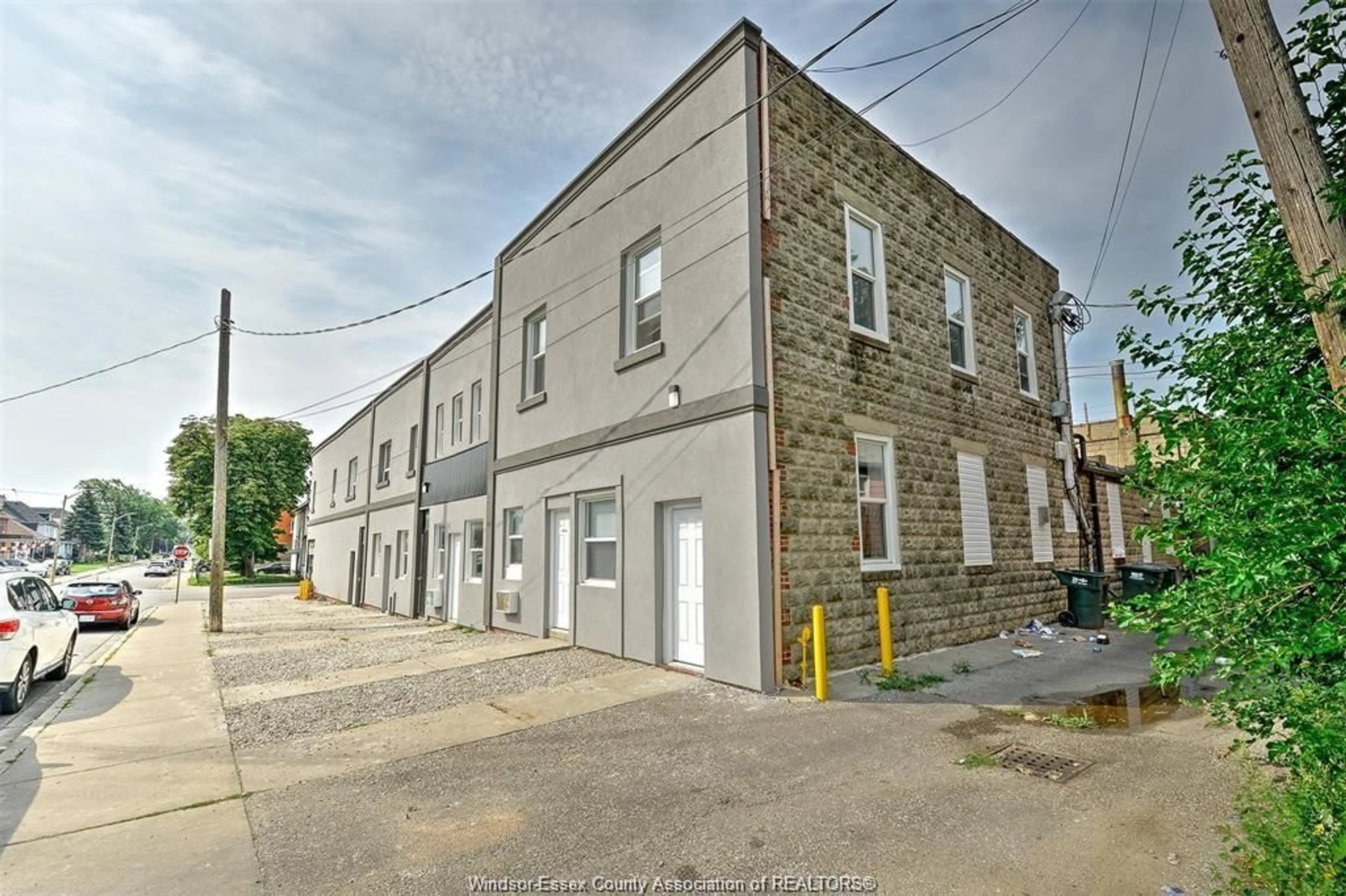 A pic from outside/outdoor area/front of a property/back of a property/a pic from drone, street for 581 PIERRE Ave #4, Windsor Ontario N9A 2K1