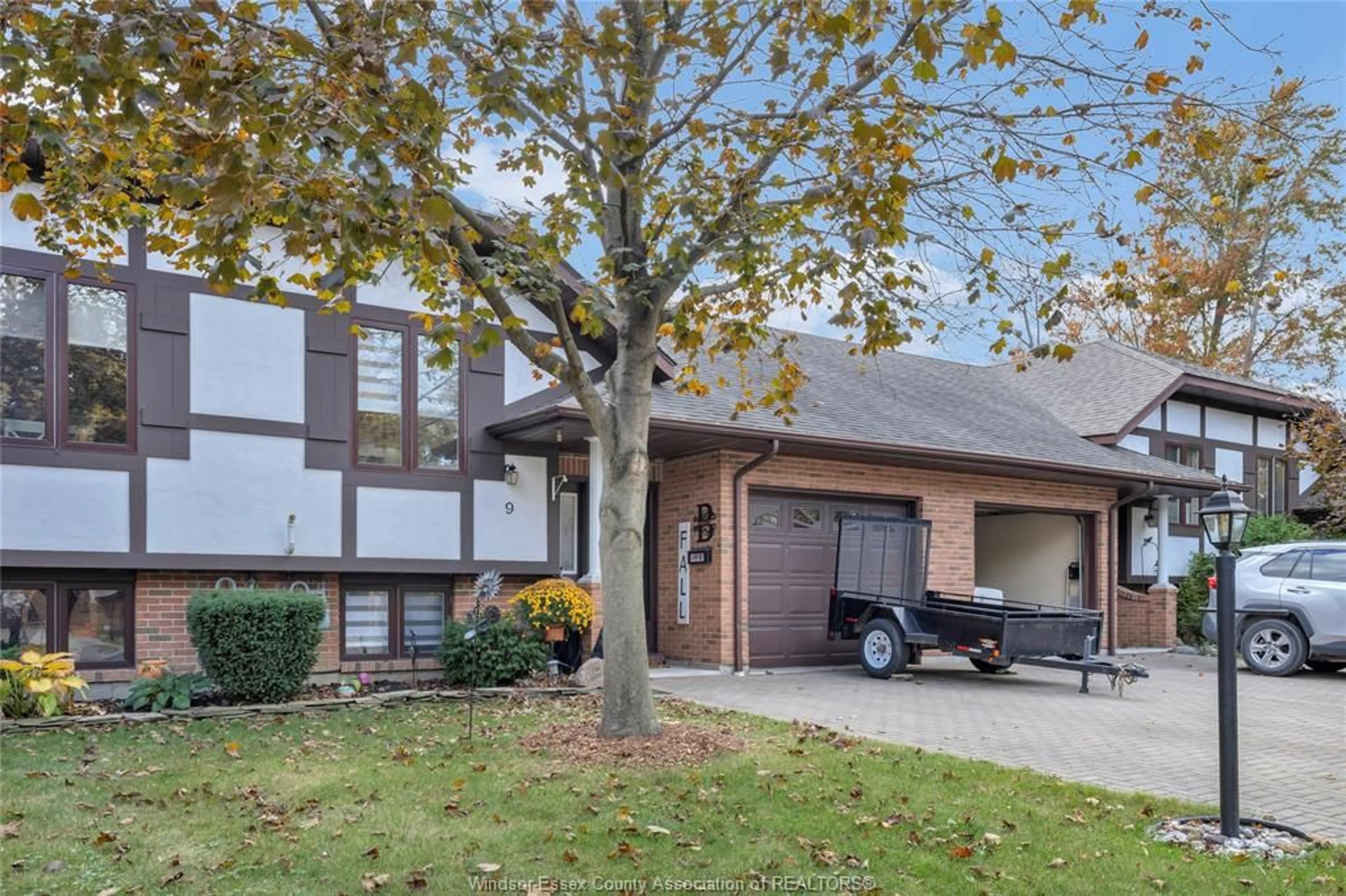 Home with brick exterior material, street for 209 Irwin #9, Essex Ontario N8M 2T5
