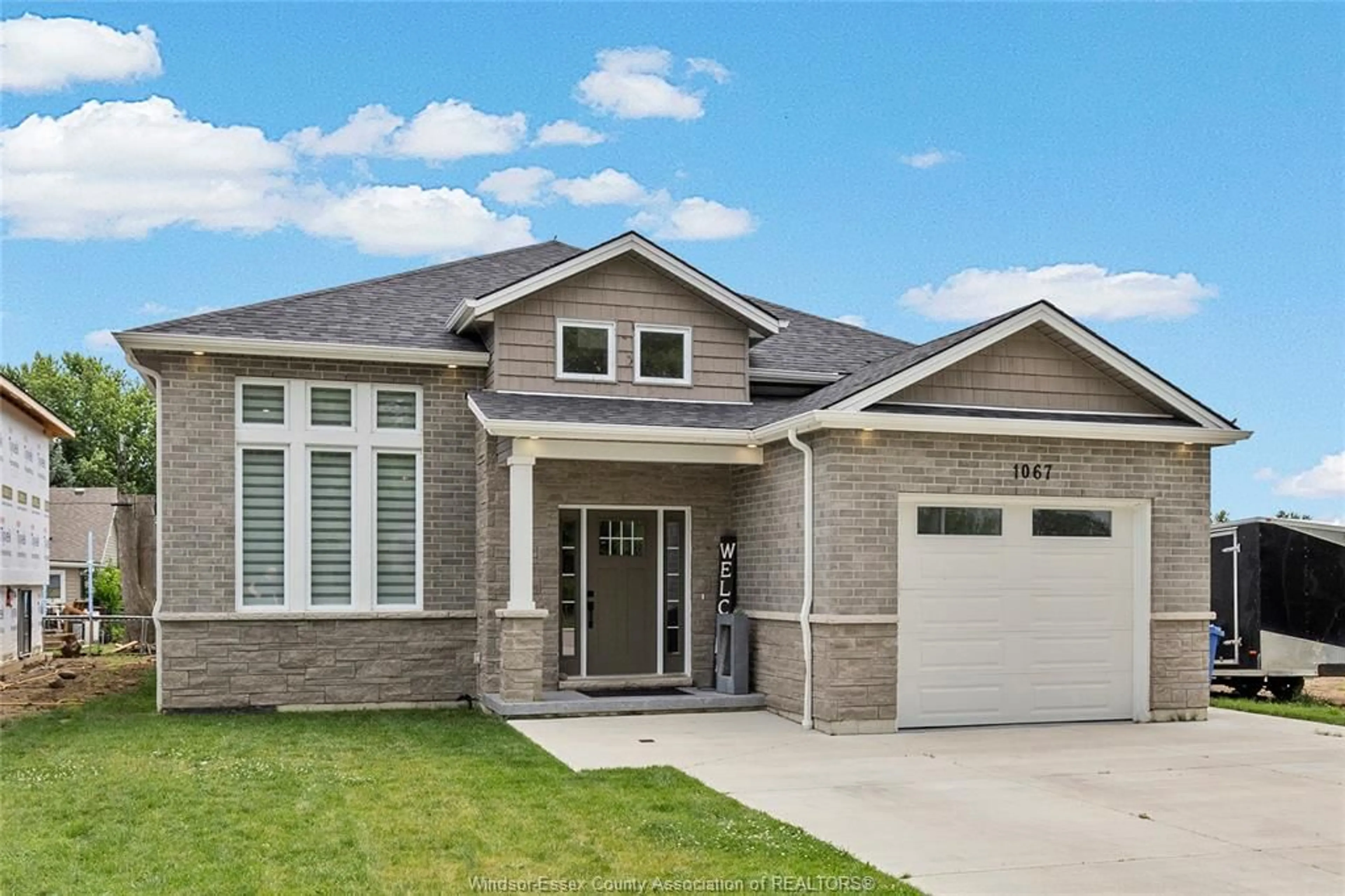 Home with brick exterior material, street for 1067 MAPLE Ave, Kingsville Ontario N9Y 3T5