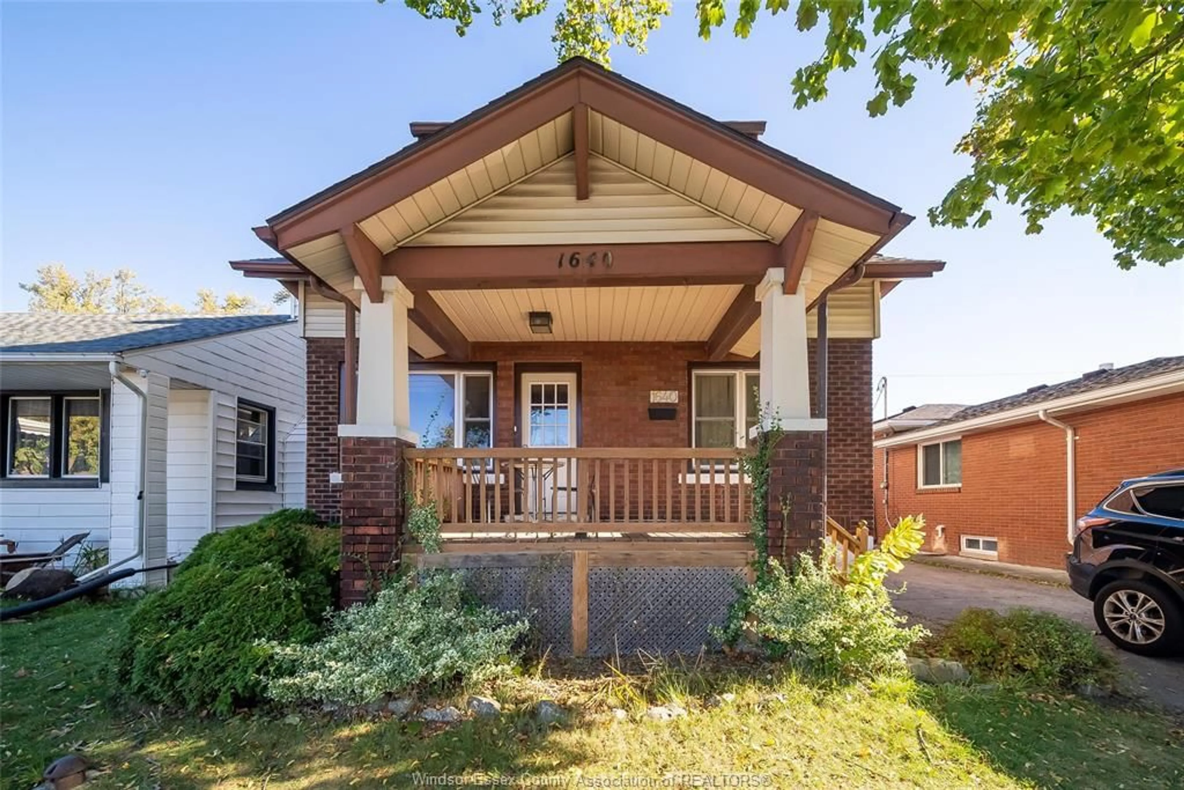 Home with brick exterior material, street for 1640 PILLETTE Rd, Windsor Ontario N8Y 3C5