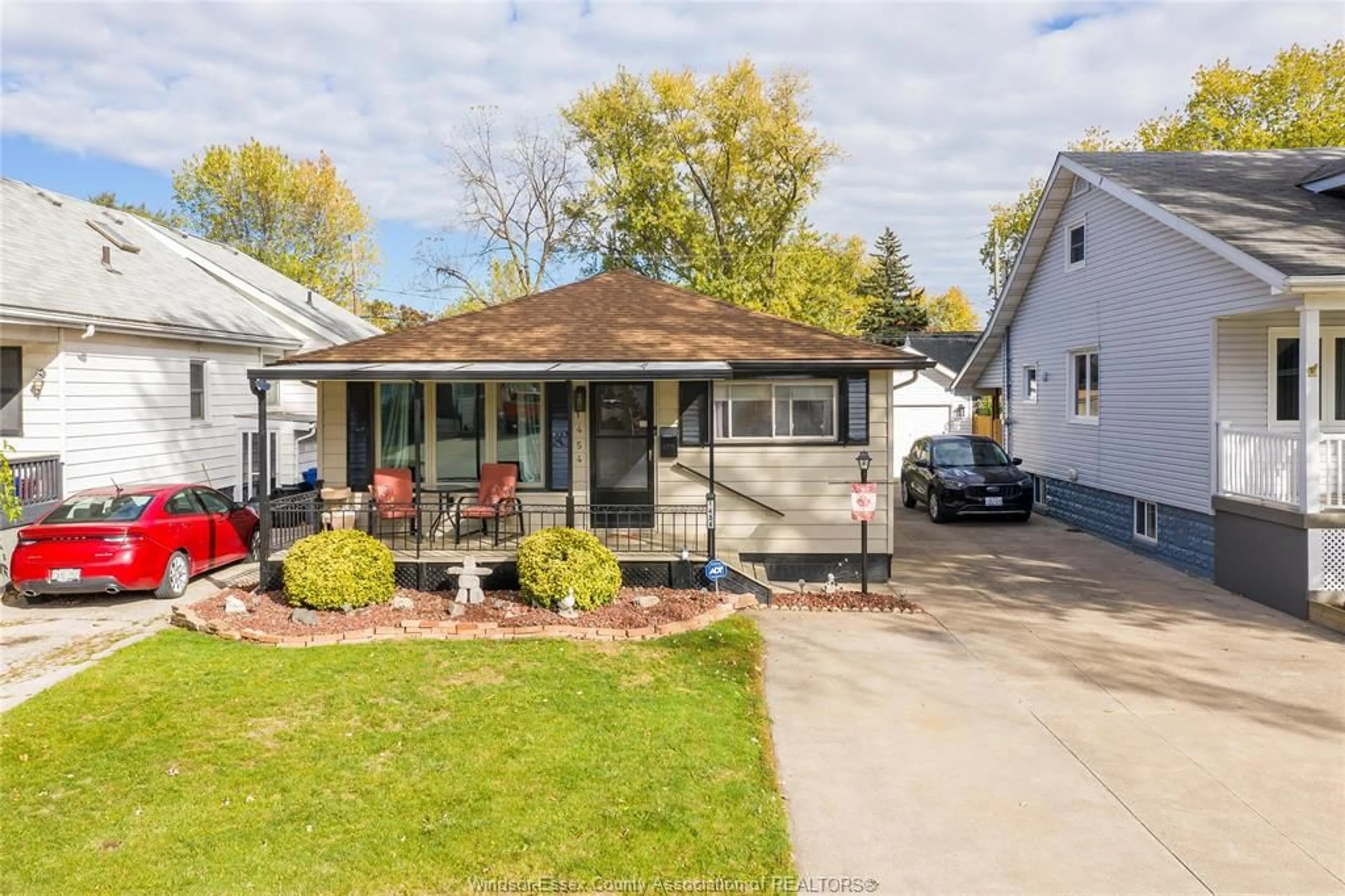 Home with vinyl exterior material, street for 1454 BERNARD Rd, Windsor Ontario N8Y 4K3