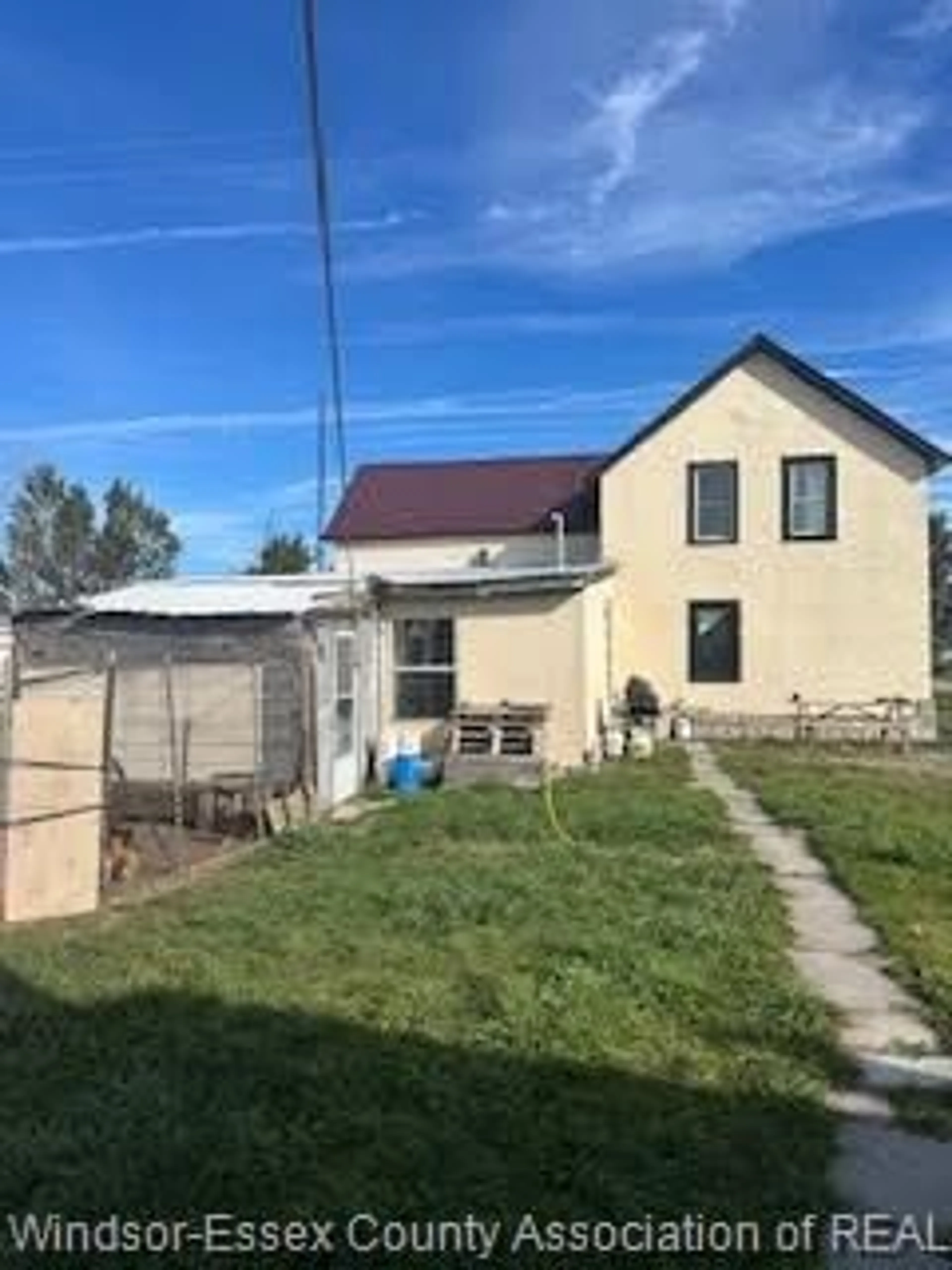 A pic from outside/outdoor area/front of a property/back of a property/a pic from drone, street for 908 Mersea Rd 10, Leamington Ontario N0P 2J0