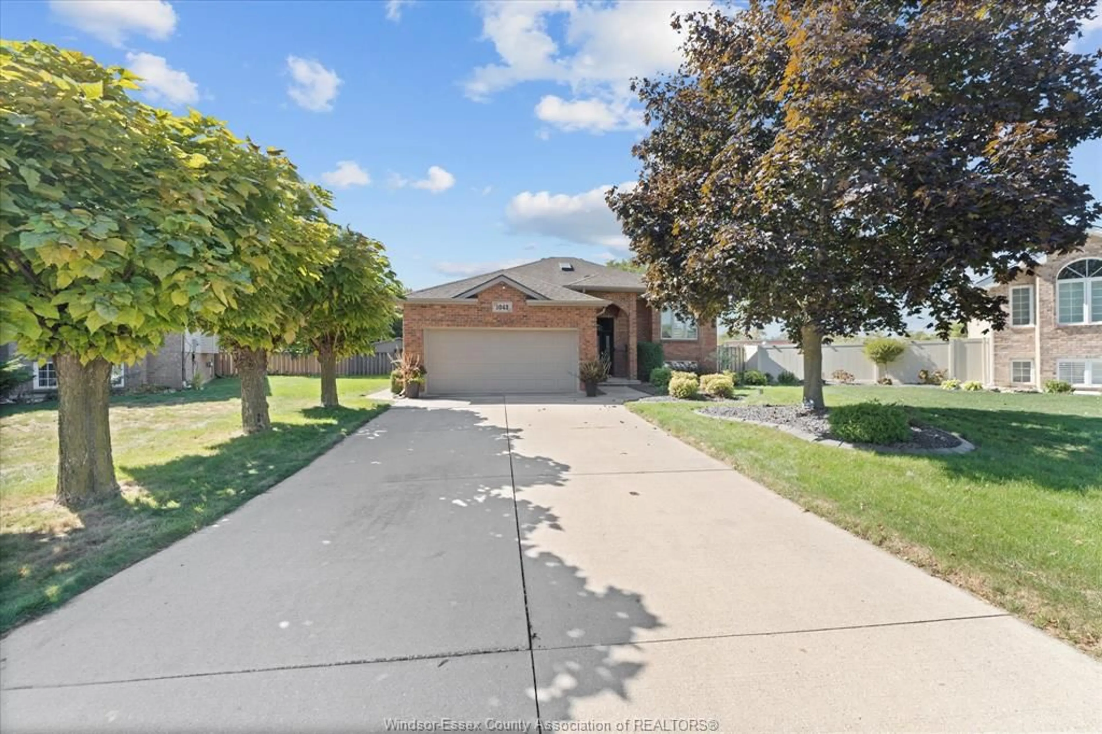A pic from outside/outdoor area/front of a property/back of a property/a pic from drone, street for 1043 SOCRATES Cres, Windsor Ontario N9G 2P2