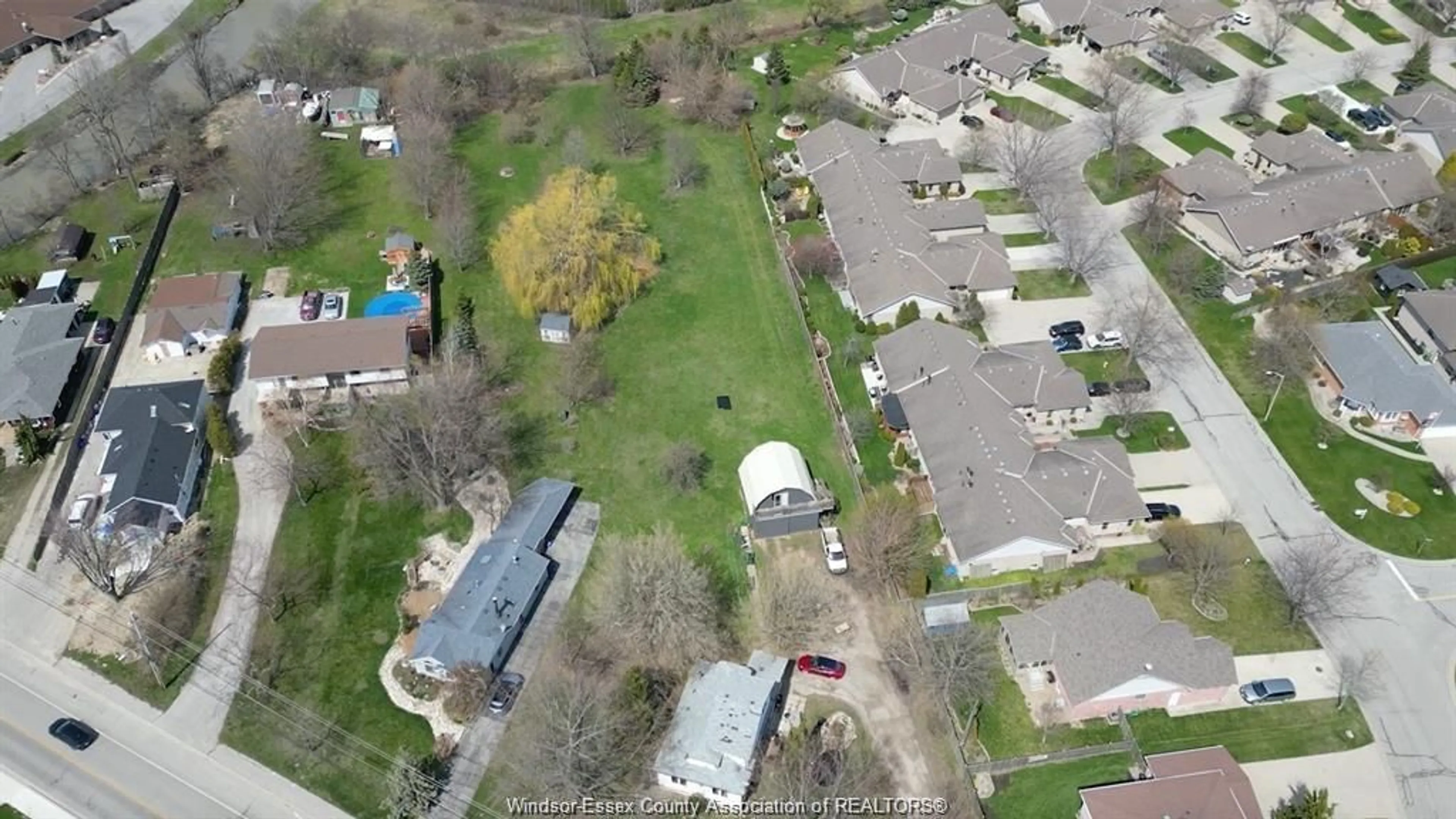 A pic from outside/outdoor area/front of a property/back of a property/a pic from drone, street for 151 Robson Road, Leamington Ontario N8H 5P9