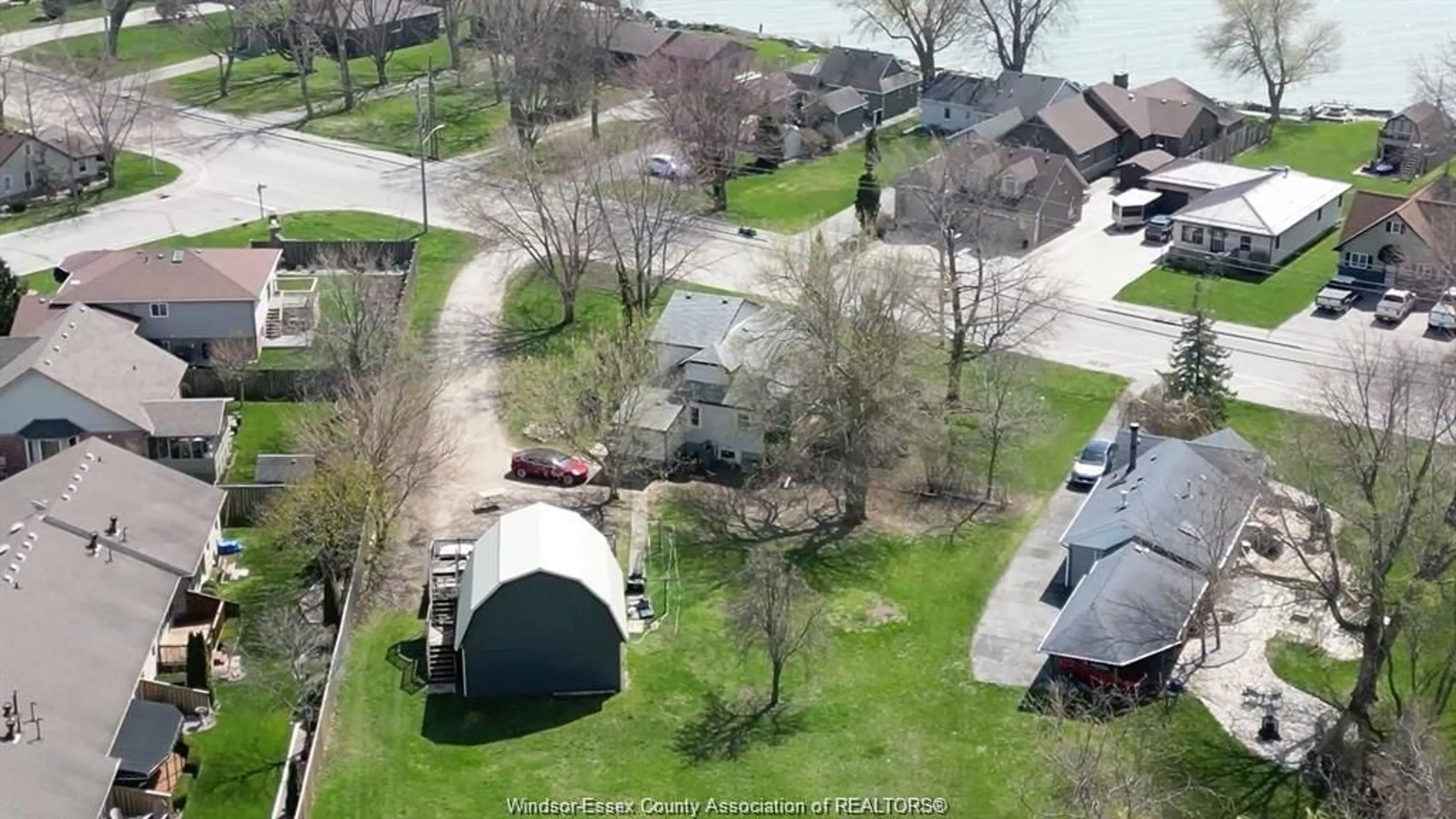 A pic from outside/outdoor area/front of a property/back of a property/a pic from drone, street for 151 Robson Road, Leamington Ontario N8H 5P9