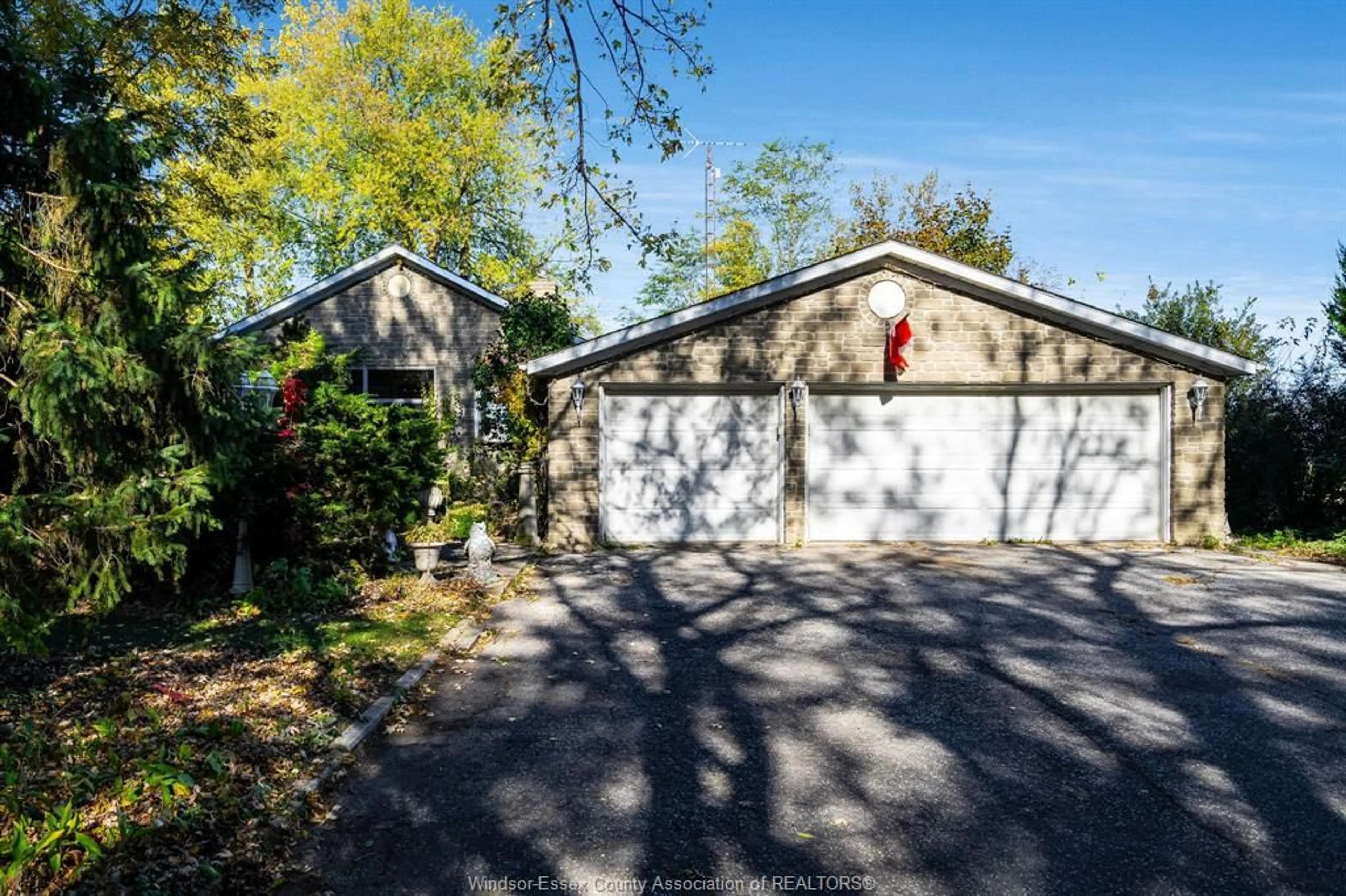 A pic from outside/outdoor area/front of a property/back of a property/a pic from drone, street for 3020 St. Clair Rd, Stoney Point Ontario N0R 1N0