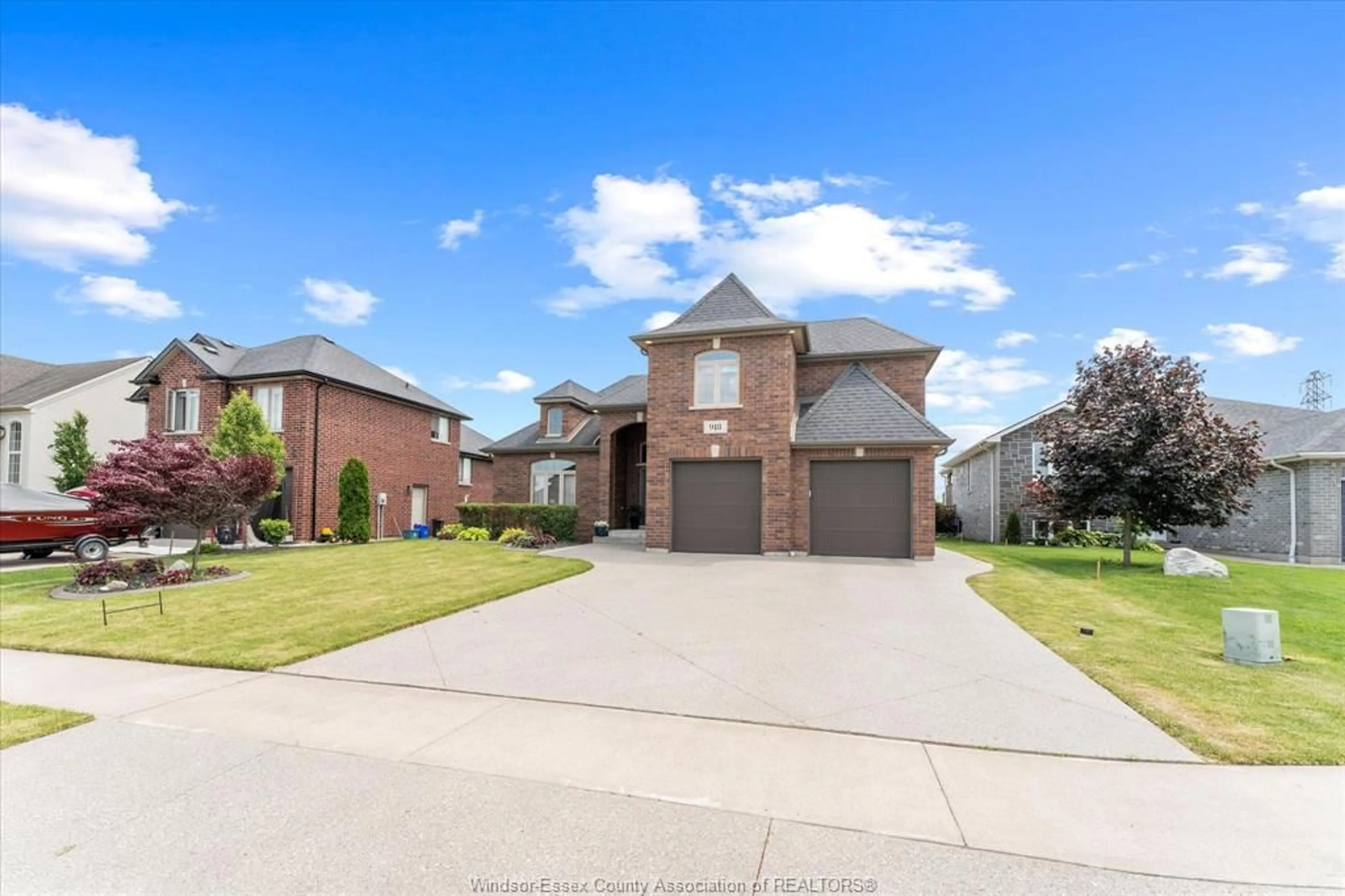 Home with brick exterior material, street for 918 DRIFTWOOD Cres, Lakeshore Ontario N0R 1A0