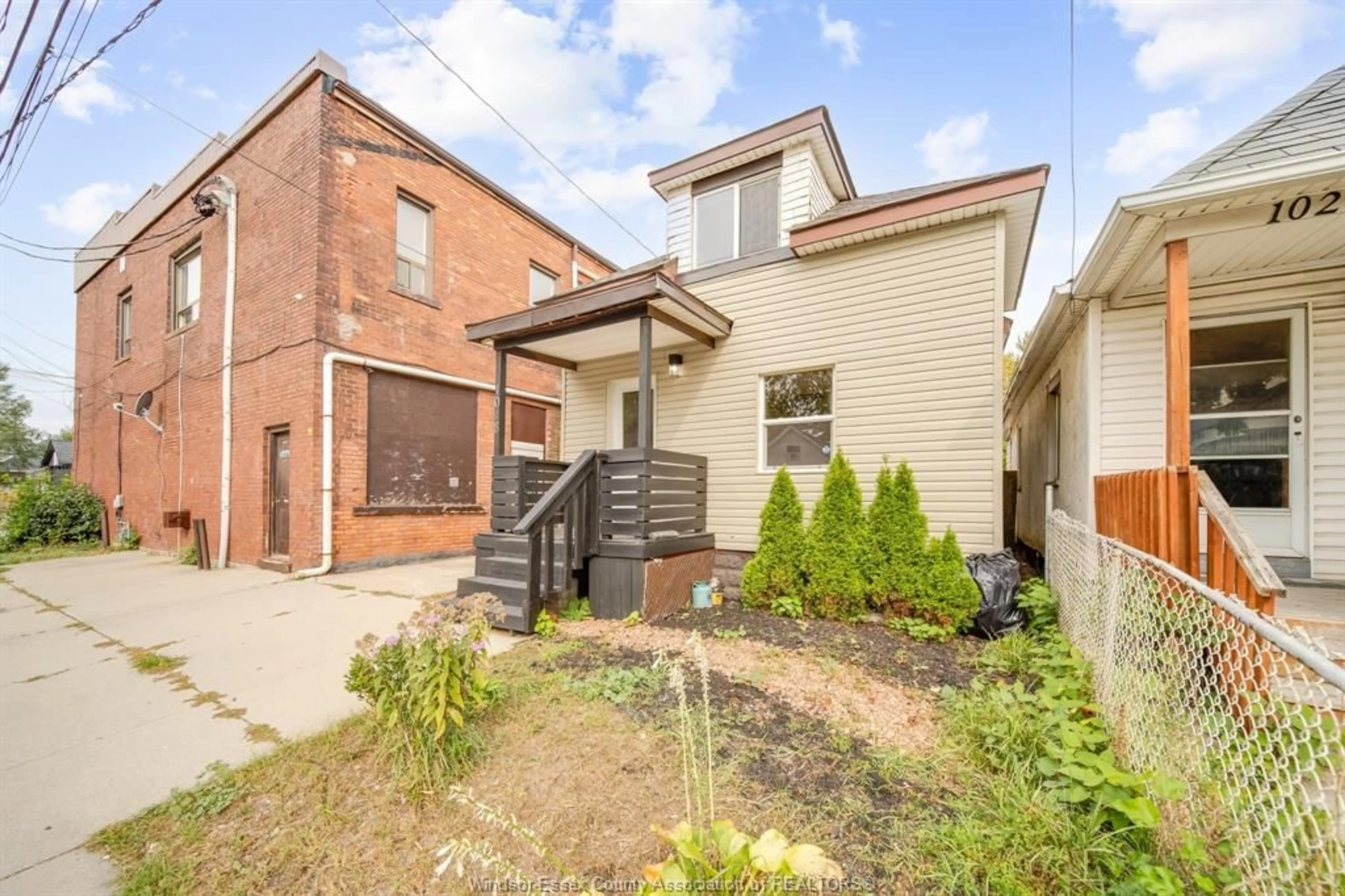 Home with brick exterior material, street for 1018 CATARAQUI St, Windsor Ontario N9A 3P8