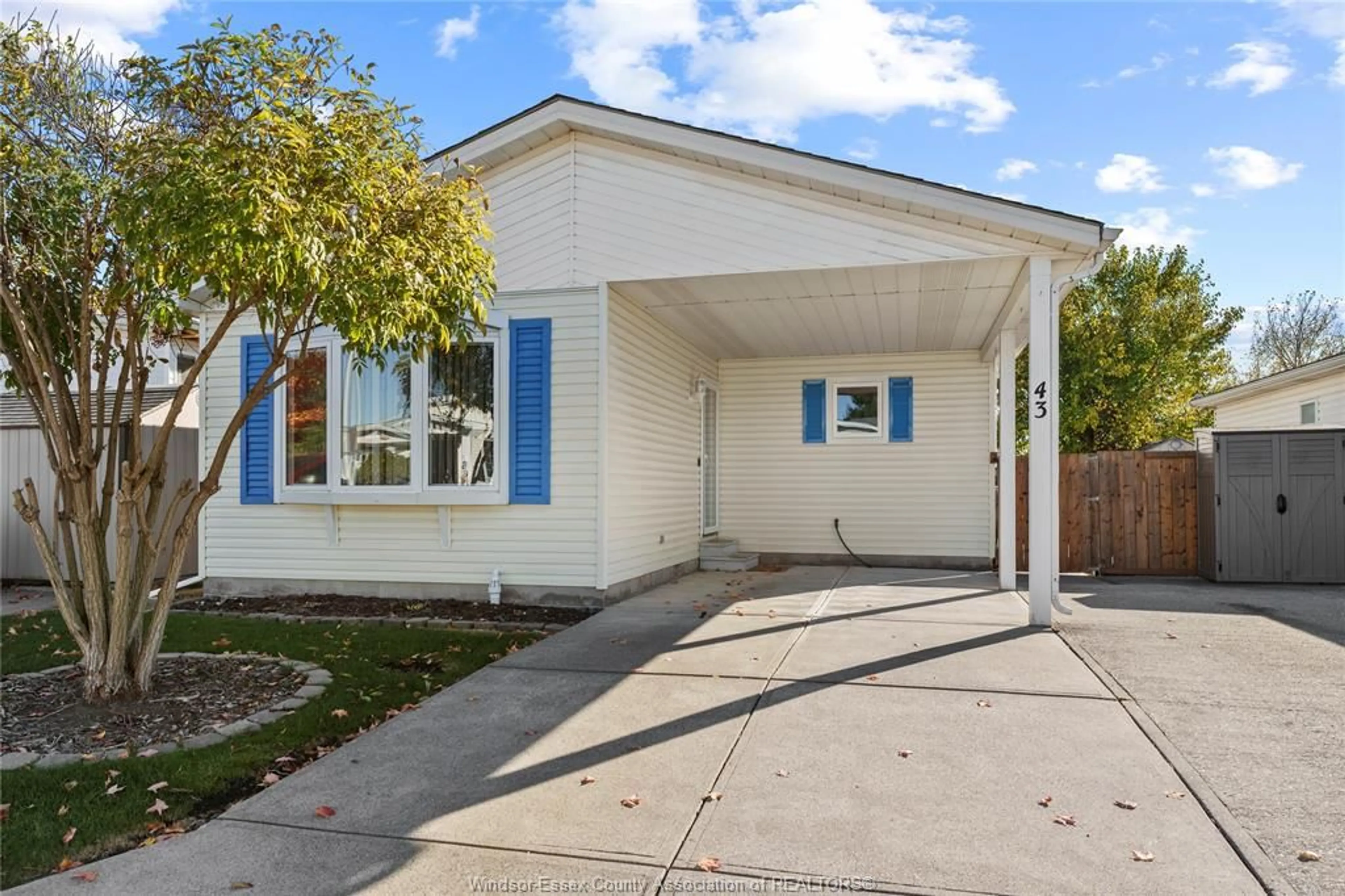 Home with vinyl exterior material, street for 43 CHERRY St, McGregor Ontario N0R 1J0