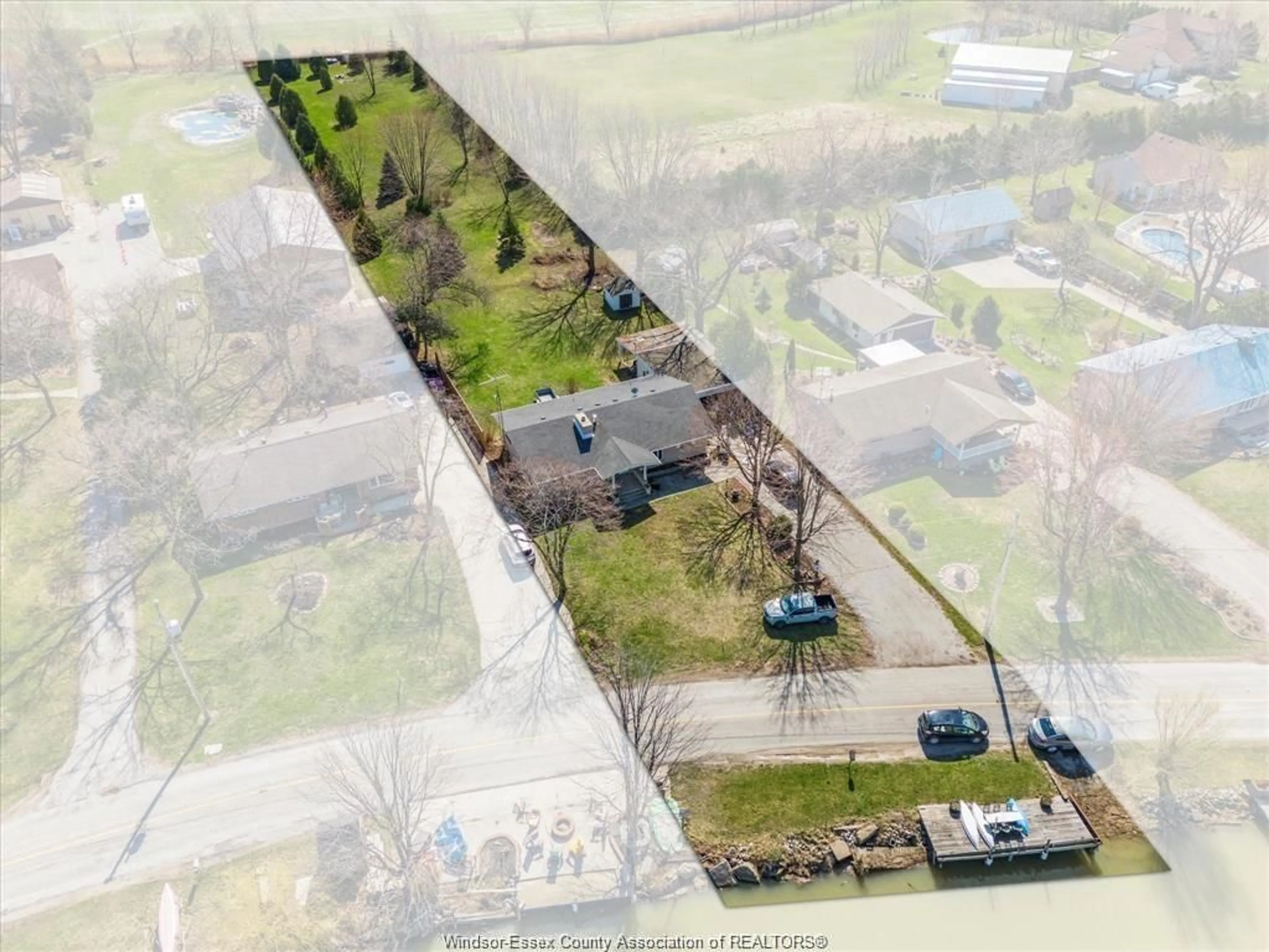 A pic from outside/outdoor area/front of a property/back of a property/a pic from drone, street for 314 EAST RUSCOM RIVER Rd, Lakeshore Ontario N0R 1S0