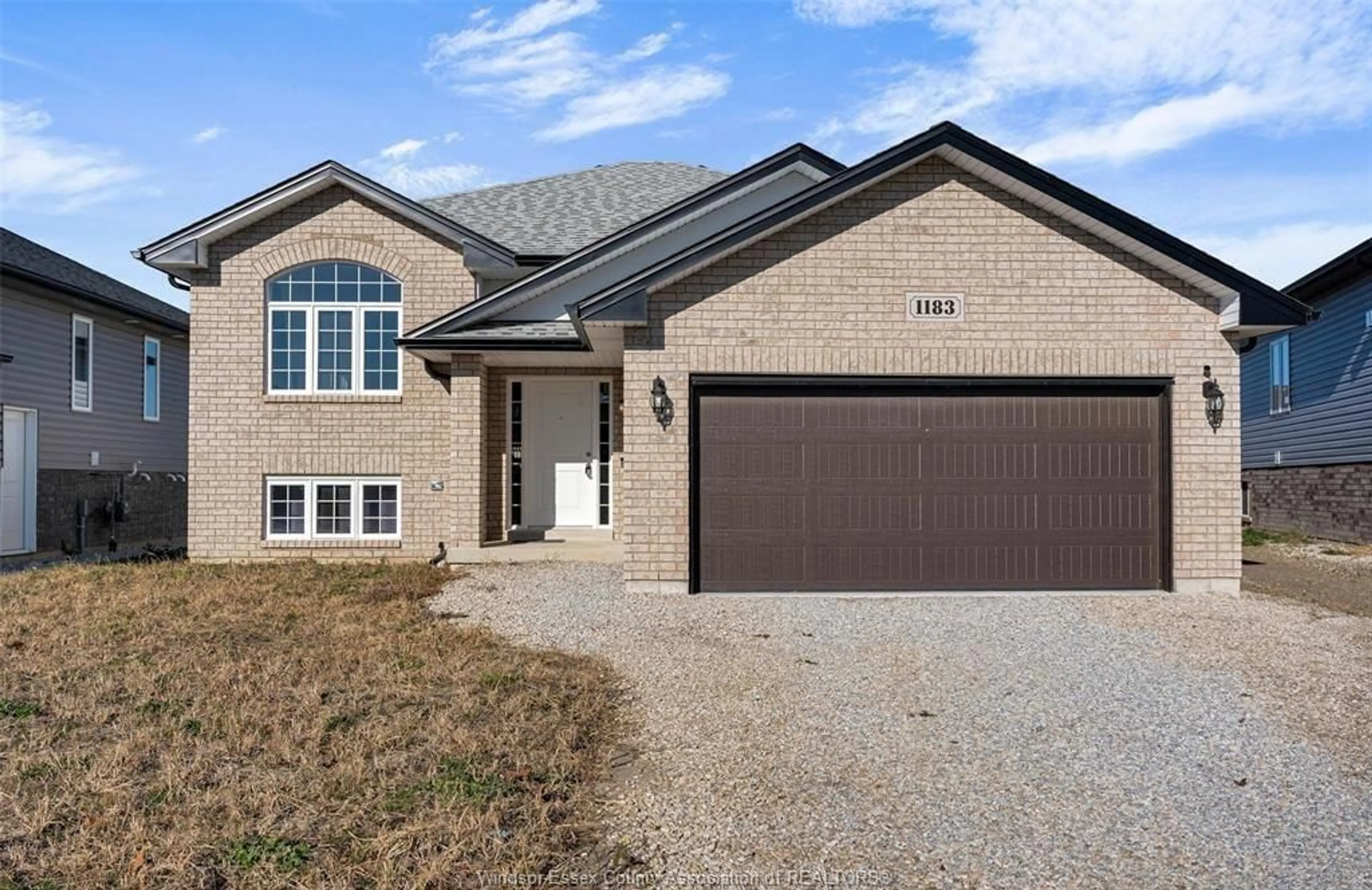 Home with brick exterior material, street for 1183 ASPEN RIDGE Cres, Lakeshore Ontario N0R 1A0