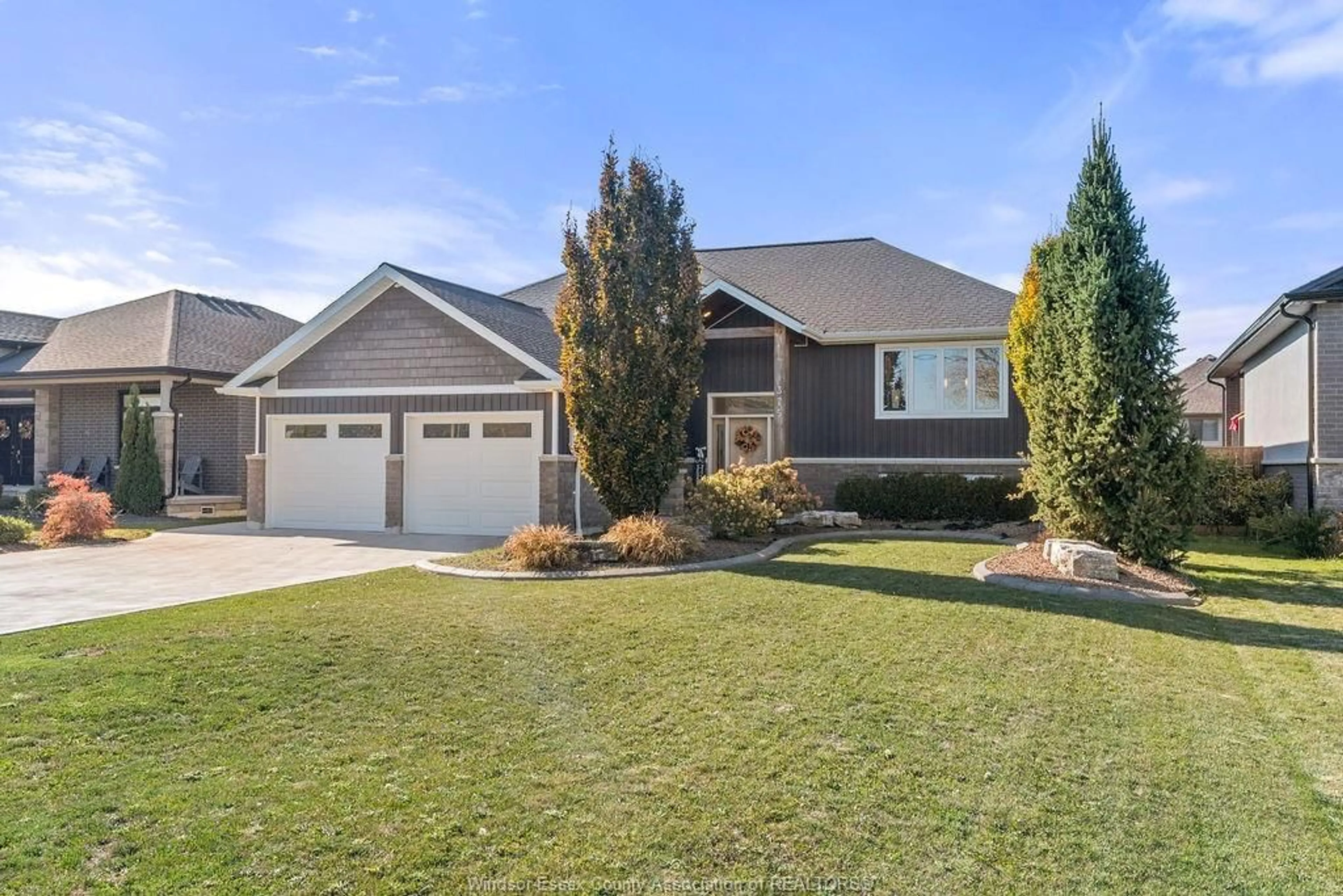 Home with vinyl exterior material, street for 375 COUNTY RD 2, Belle River Ontario N0R 1A0