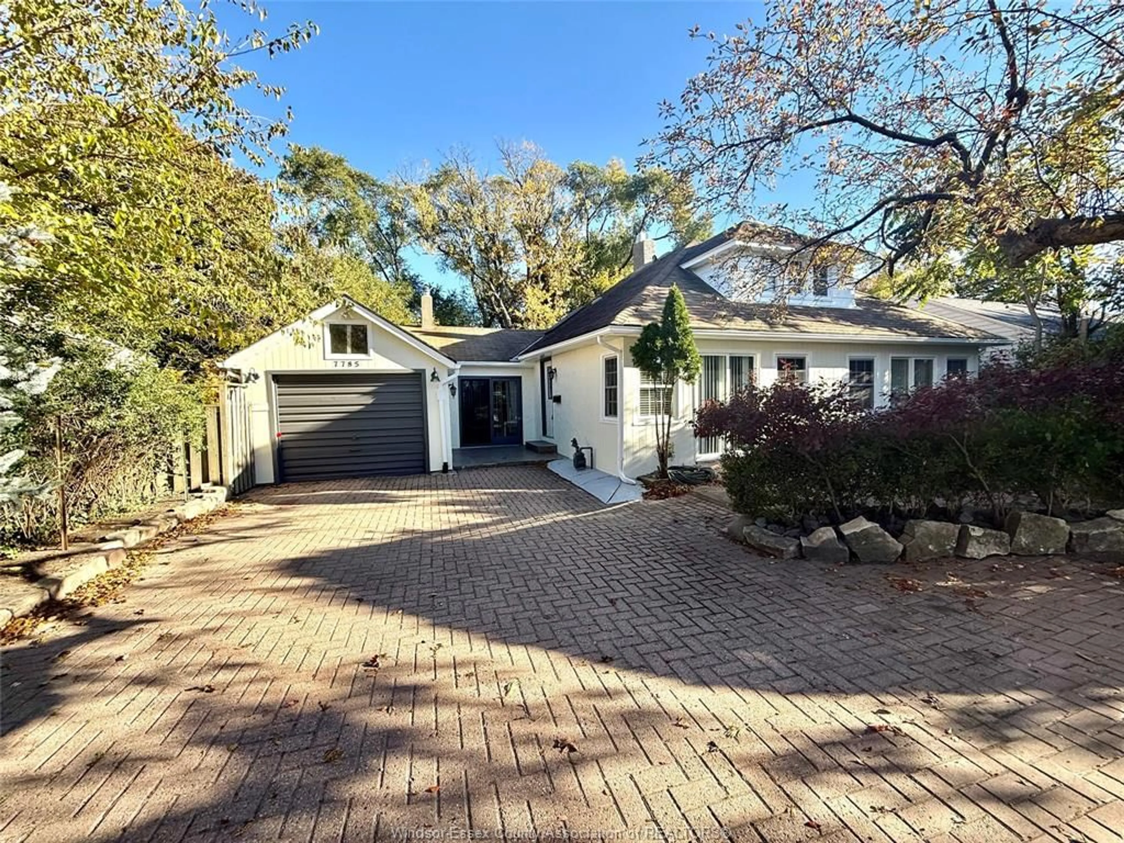 A pic from outside/outdoor area/front of a property/back of a property/a pic from drone, street for 7785 RIVERSIDE Dr, Windsor Ontario N8S 1E1