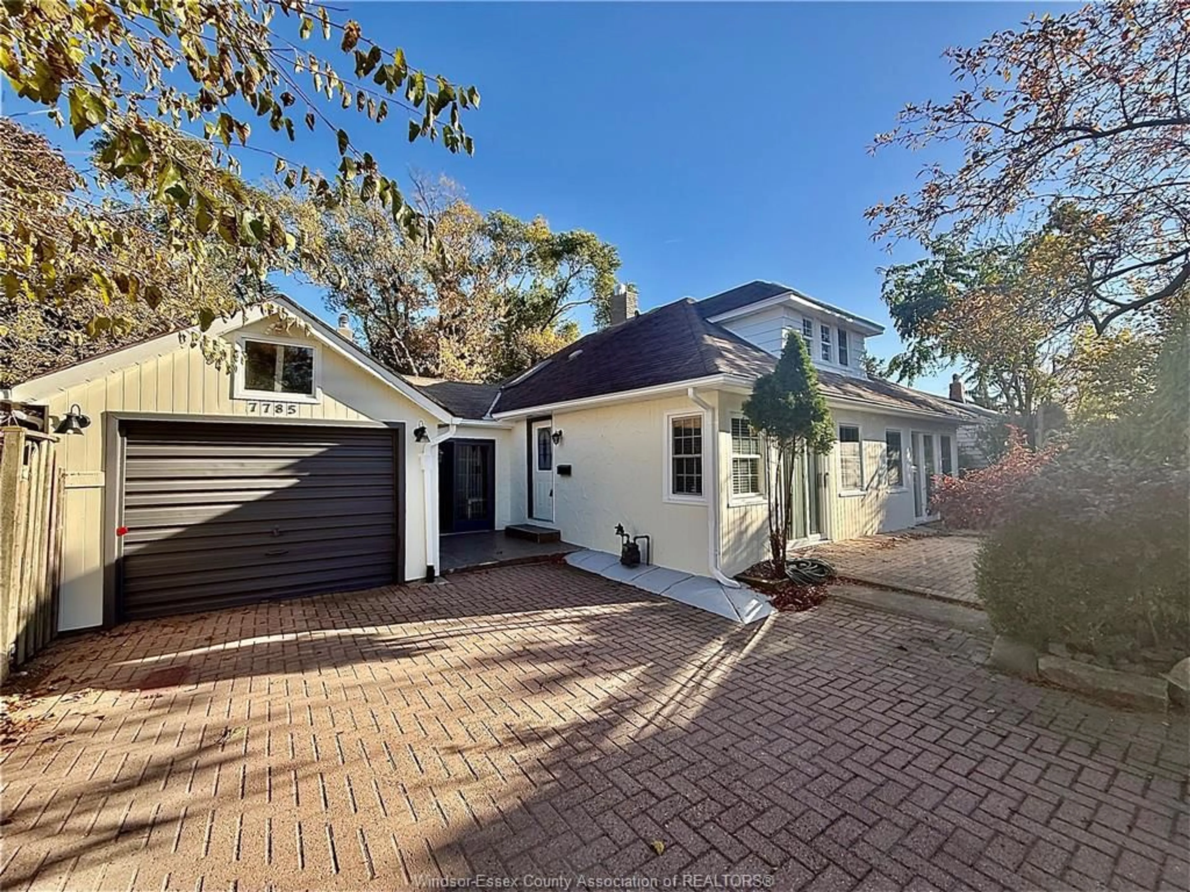 A pic from outside/outdoor area/front of a property/back of a property/a pic from drone, street for 7785 RIVERSIDE Dr, Windsor Ontario N8S 1E1