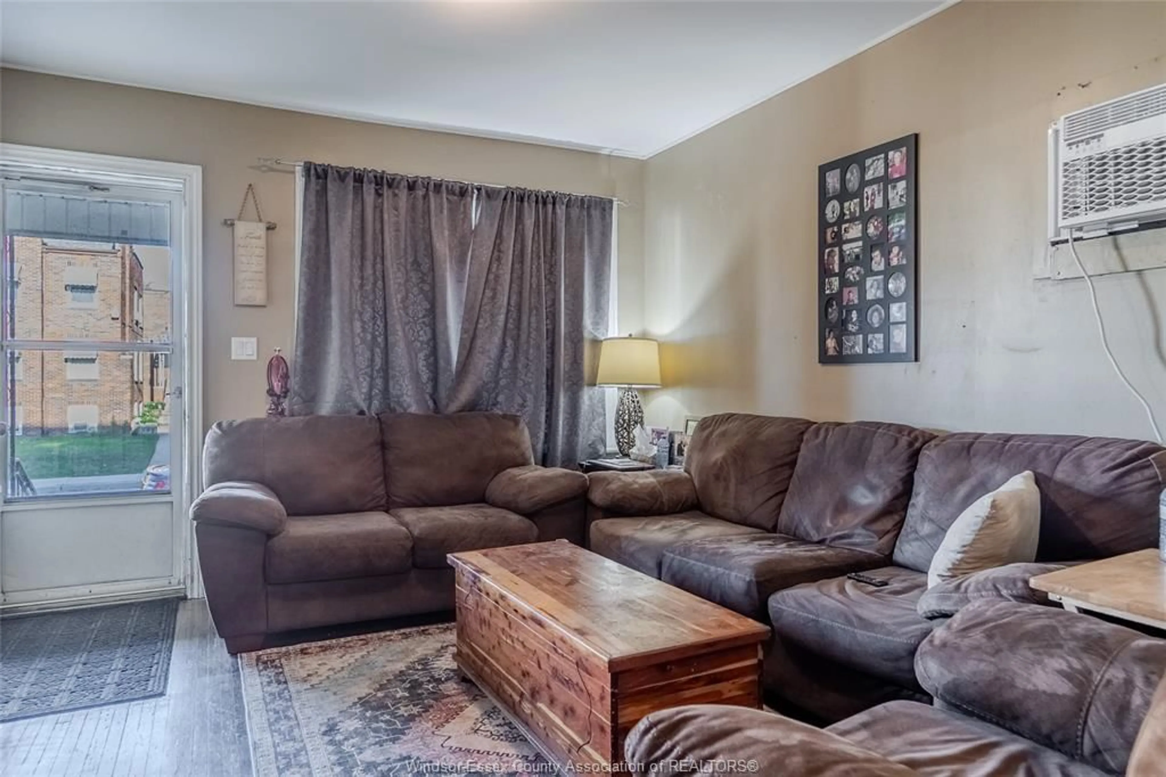 Living room with furniture, unknown for 1557 Goyeau St, Windsor Ontario N8X 3L3