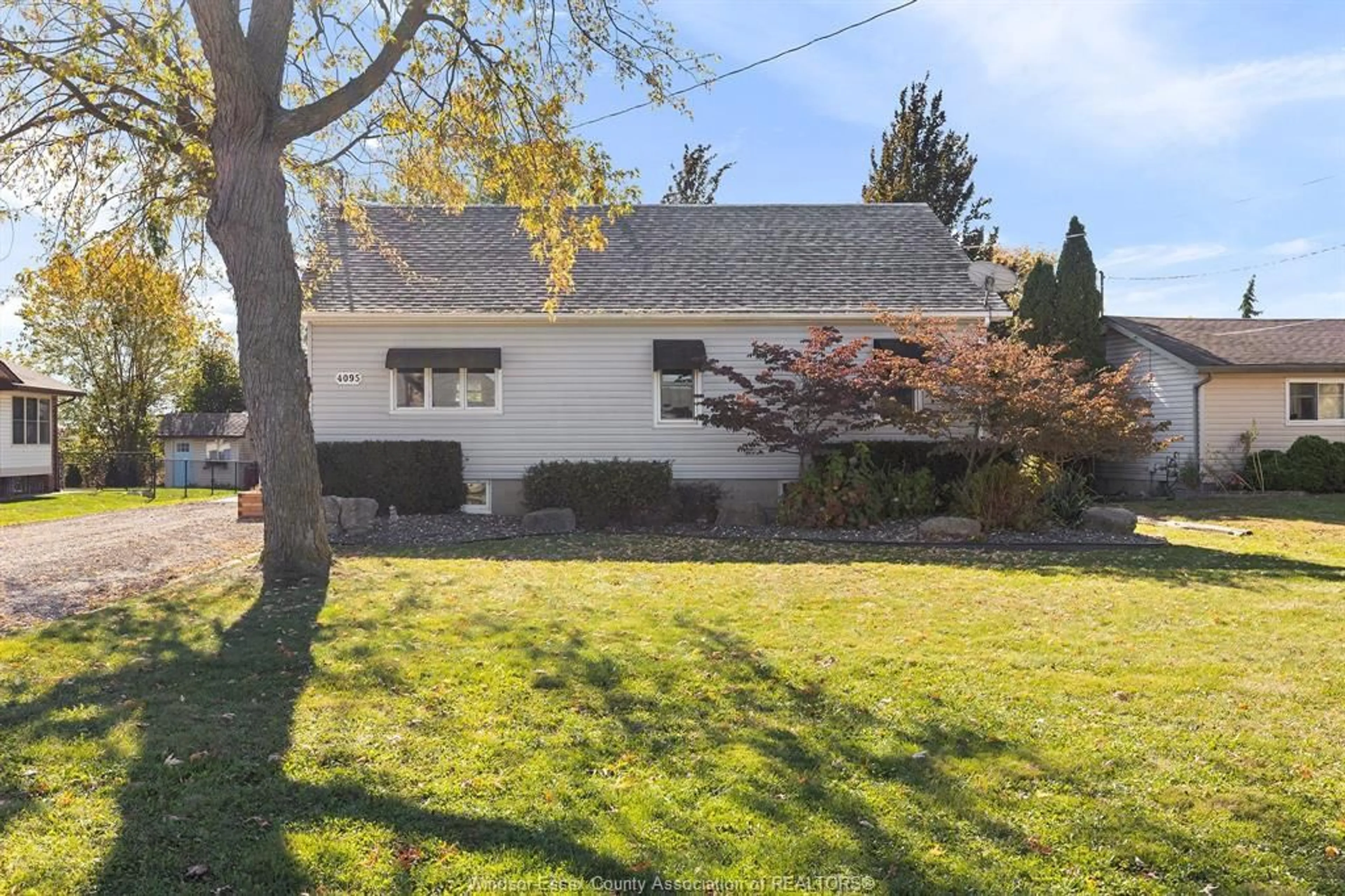 A pic from outside/outdoor area/front of a property/back of a property/a pic from drone, street for 4095 Baseline, Windsor Ontario N9A 6J3