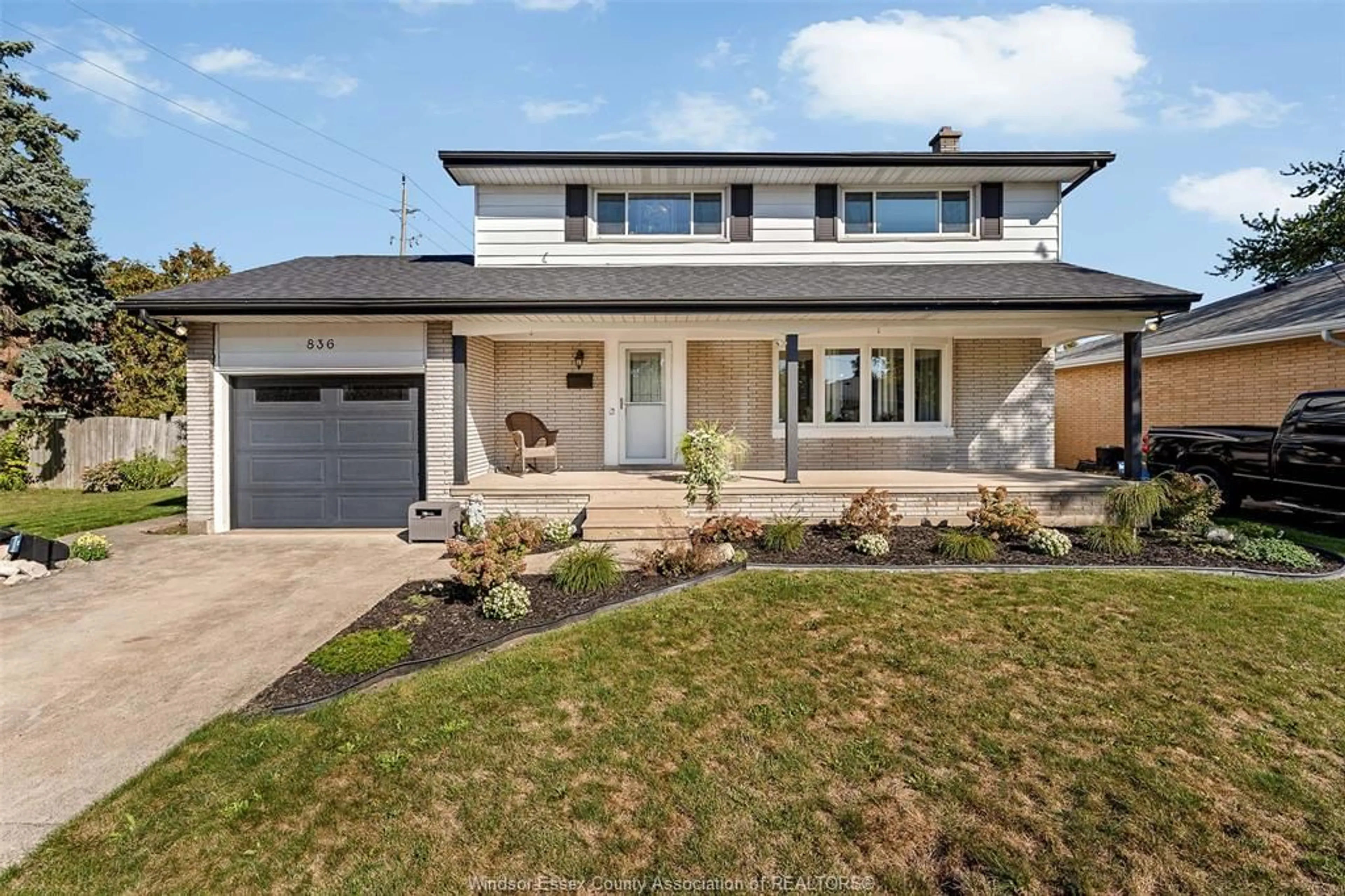Home with brick exterior material, street for 836 RHOLAINE Dr, Windsor Ontario N8S 3Z8