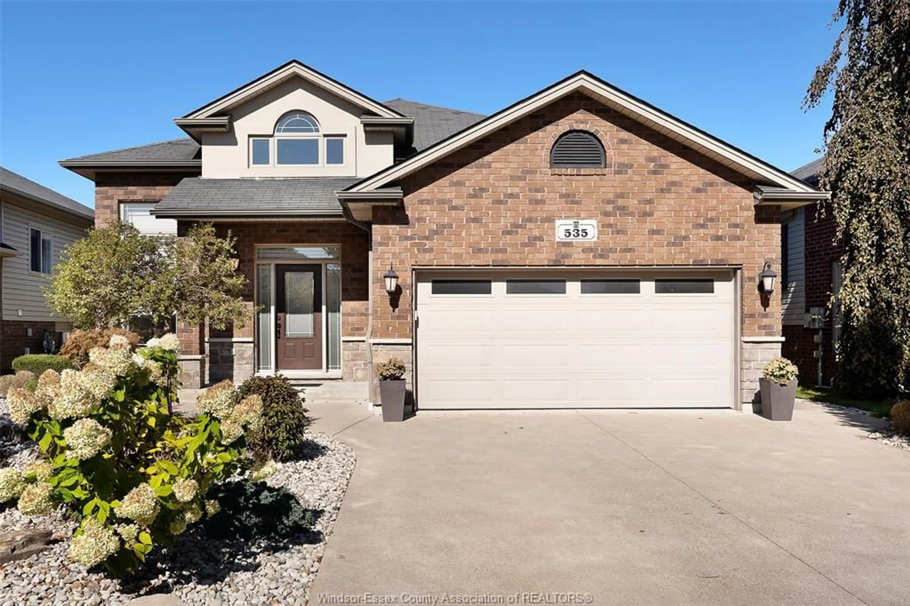 Home with brick exterior material, street for 535 DUNN Ave, LaSalle Ontario N9J 0A4